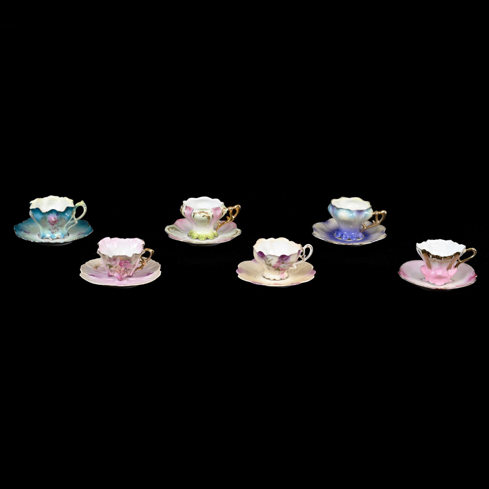 (6) Cups & Saucers, Unmarked R.S. Prussia: (6) Cups & Saucers, Unmarked R.S. Prussia, 2" x 4.25" approximately, Various Mold And Colors, See Photos For Details, Lee & Carol Marple Collection.