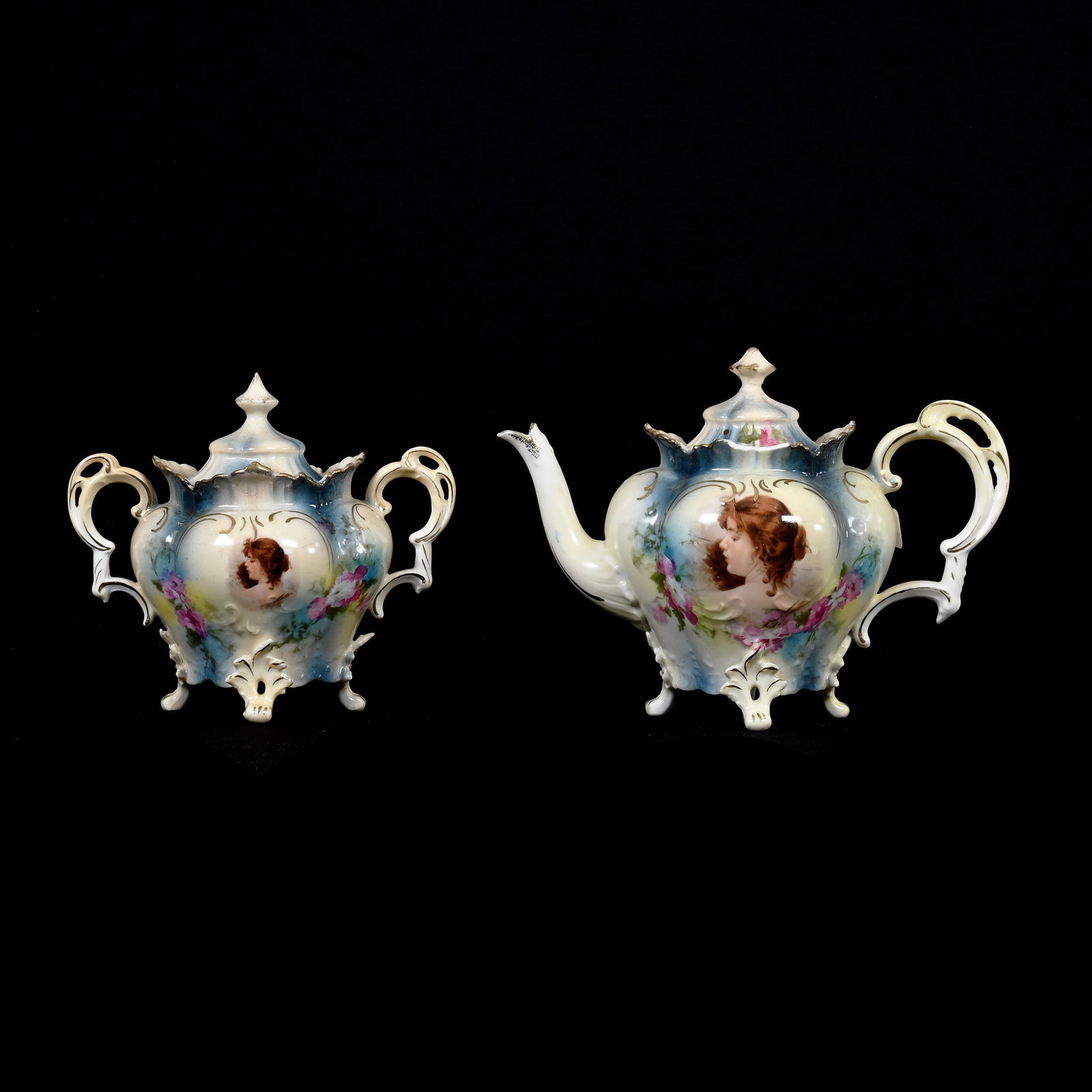 Teapot/Matching Sugar, Unmarked R.S. Prussia: Teapot/Matching Sugar, Unmarked R.S. Prussia, Blue And Cream Tones, Countess Leita Portrait, Pink Floral Decor, (1) 6.25" x 8.5" Tea Pot, Major Rim Chip, (1) Matching Sugar Bowl In Good Condition, Lee