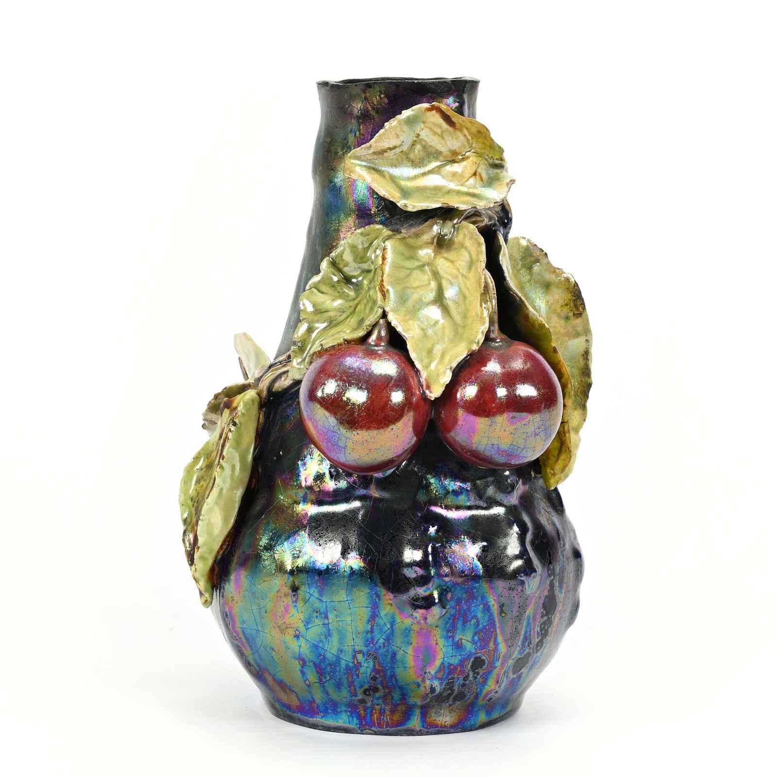 Vase, Unmarked Zsolnay Style Art Glass: Vase, Unmarked Zsolnay Style Art Glass, 5.75" x 3.75", Iridescent Body With Cherry Decor, Rim With Possible Repair, Leaves With Repair & Chips, Rodger Shinn Collection, Kansas.