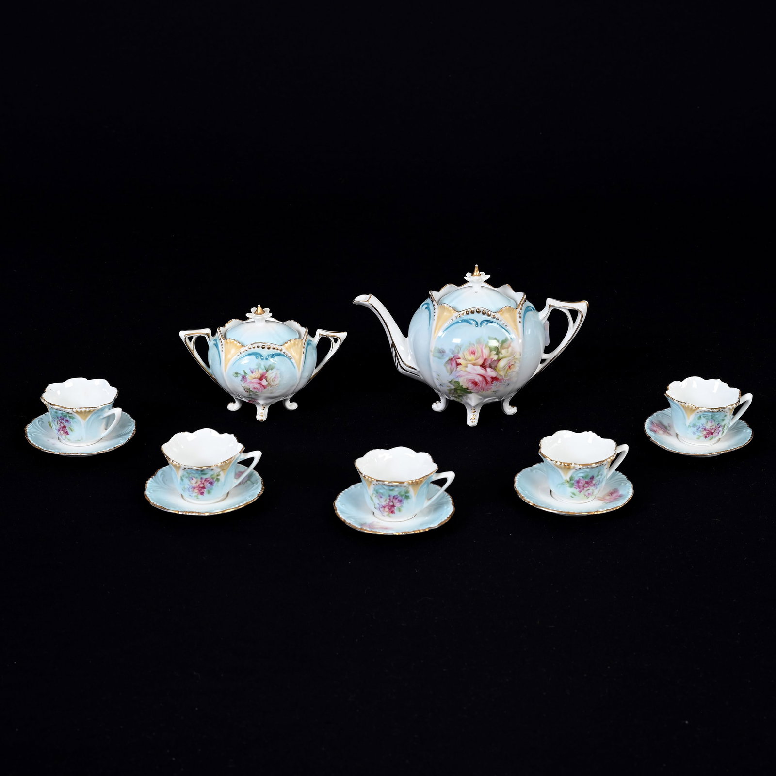 Child's Tea Set, Unmarked R.S. Prussia: Child's Tea Set, Unmarked R.S. Prussia, Blue, White And Cream Tones, Rose Decor, (1) 4.25" X 6.25" Tea Pot, Matching Sugar, No Creamer, (5) Matching Cups & Saucers, Tea Pot Lid Has Nick On Finial, Har
