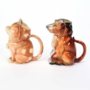 (2) Pitchers, Royal Bayreuth: (2) Pitchers, Royal Bayreuth, Milk Pitchers, (1) 5" Dachshund, Brown Tones, Unmarked, (1) 4.75" Cat, Brown With White Spots, Blue Mark, Harold & Joeleen Passow, Iowa.