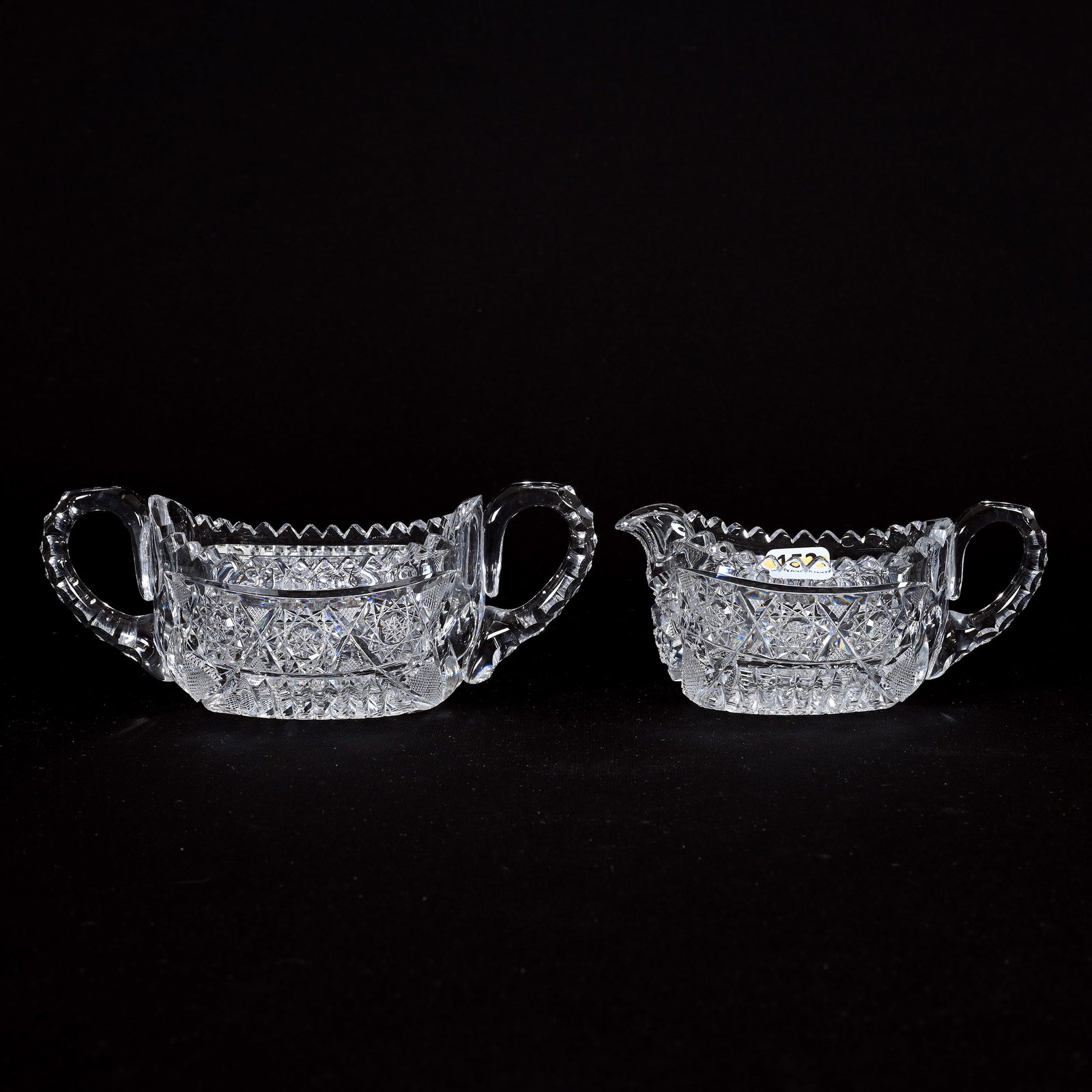 Creamer & Sugar Set, ABCG, Signed Pitkin & Brooks: Creamer & Sugar Set, American Brilliant Cut Glass, Signed Pitkin & Brooks, 3"x 7.25", Border Pattern, Triple Notched Handles, Hobstar Base, Oval Form, Sugar Has Tooth Chip, Wilbur & The Late Mary Bluh
