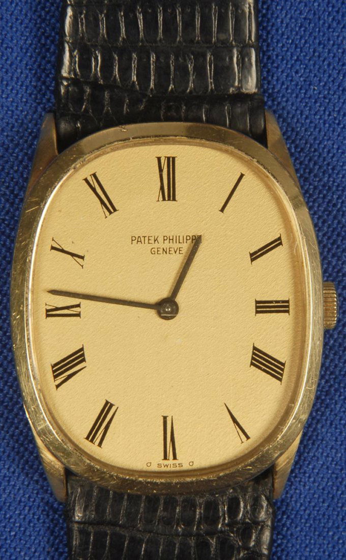 SWISS PATEK PHILIPPE 18KT GOLD "ELLIPSE" MENS WRIS: SWISS PATEK PHILIPPE 18KT GOLD "ELLIPSE" MENS WRIST WATCH BLACK LEATHER BAND - 18KT GOLD BUCKLE - VERY GOOD CONDITION