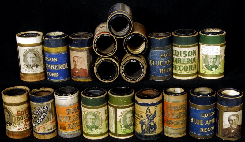 (20) ORIGINAL EDISON AMBEROL & COLUMBIA CYLINDER RE: (20) ORIGINAL EDISON AMBEROL & COLUMBIA CYLINDER RECORDS IN CASES (NO LIDS) INCLUDES: MY HULA HULA LOVE; THE SWAN; DOWN WHERE THE BIG BANANAS GROW; FANTASIA; THE ARKANSAS TRAVELER; MARY; THE BOOMERANG