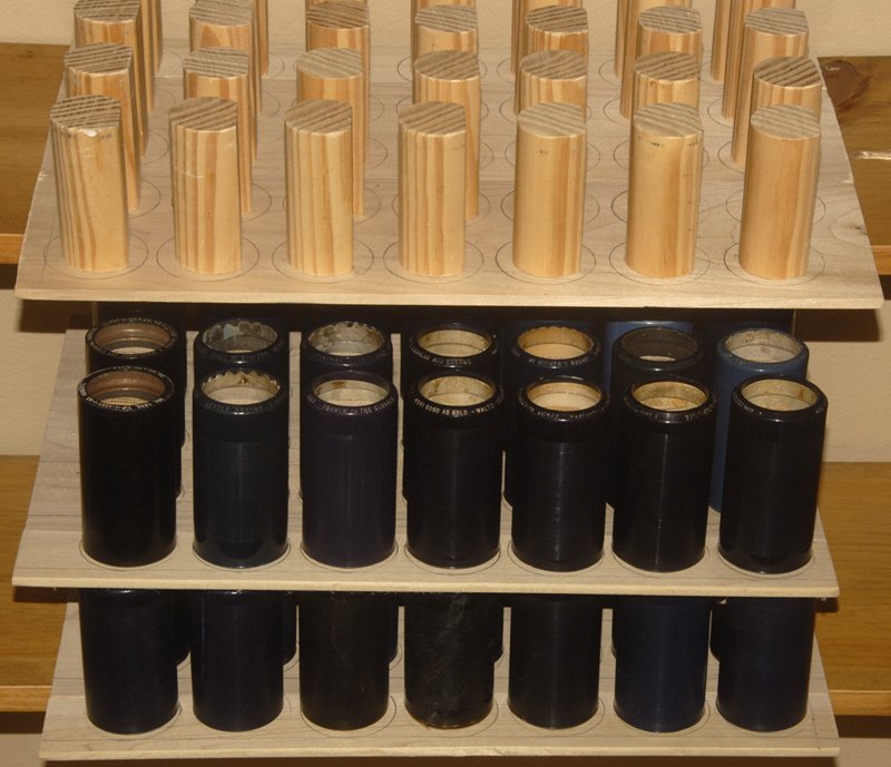 (56) ORIGINAL EDISON AMBEROL CYLINDER RECORDS ON H: (56) ORIGINAL EDISON AMBEROL CYLINDER RECORDS ON HOMEMADE WOODEN HOLDERS EACH HOLDER ABLE TO HOLD 35 CYLINDERS (NO CASES - RANDOM TITLES INCLUDE: THE BROADWAY BLUES; THAT WONDERFUL MOTHER OF MINE; THE