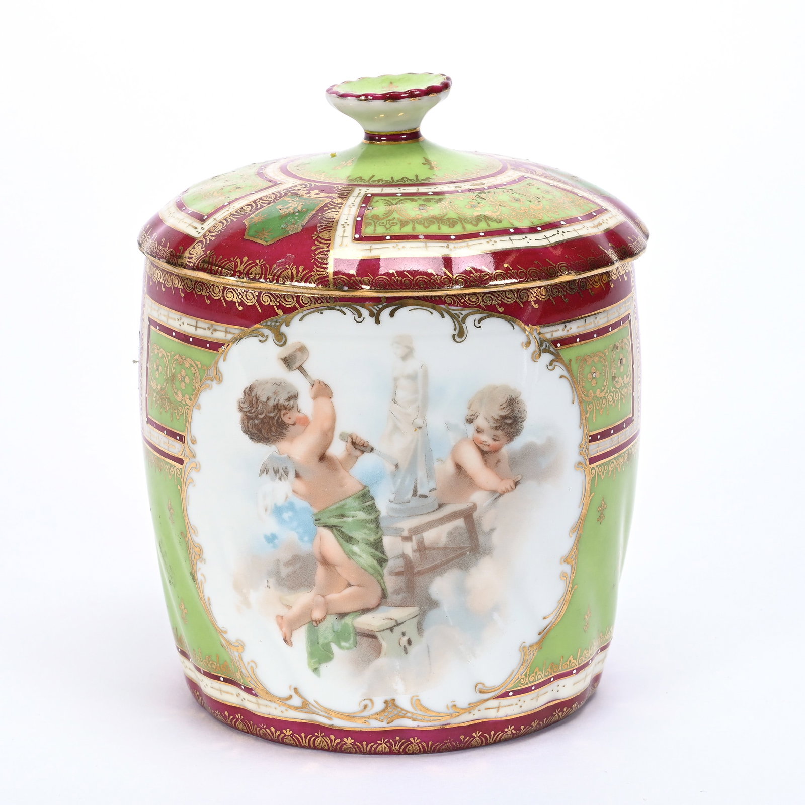 Biscuit Jar Marked Beehive: Biscuit Jar Marked Beehive, 7" x 5.5", Scene Of Two Cherubs Sculpting Statue, Green And Maroon Border, Gold Stencil Highlights, Texas Private Collection.