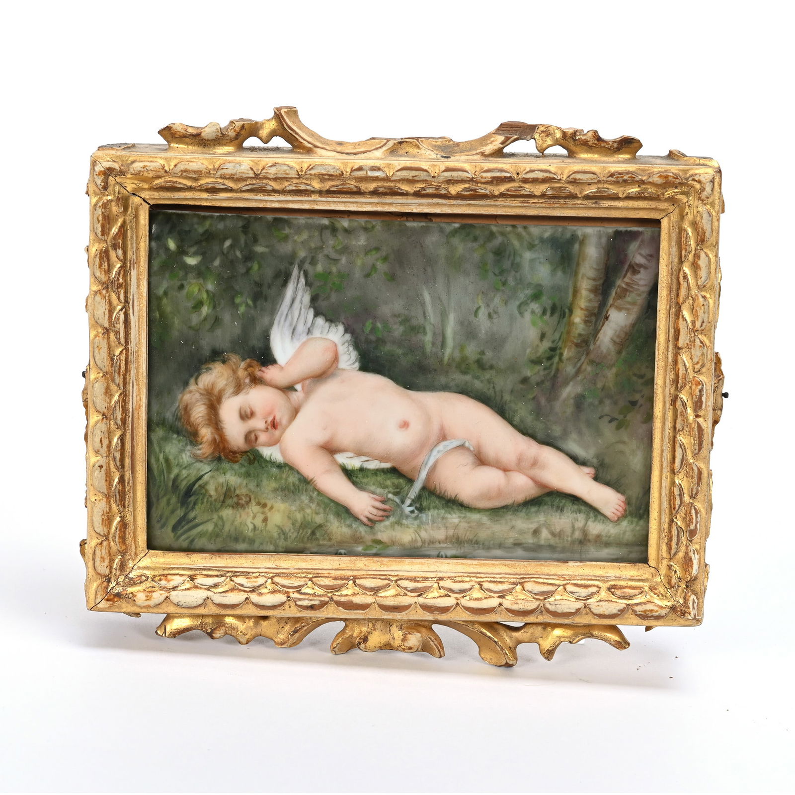Hand Painted Plaque, Cherub Asleep Scene, KPM Style: Hand Painted Plaque, Cherub Asleep Scene, KPM Style, 3.5" x 5.25", Mounted In Gilt Wooden Frame (Frame Border With Serious Loss), Estate Of Ray Callander.
