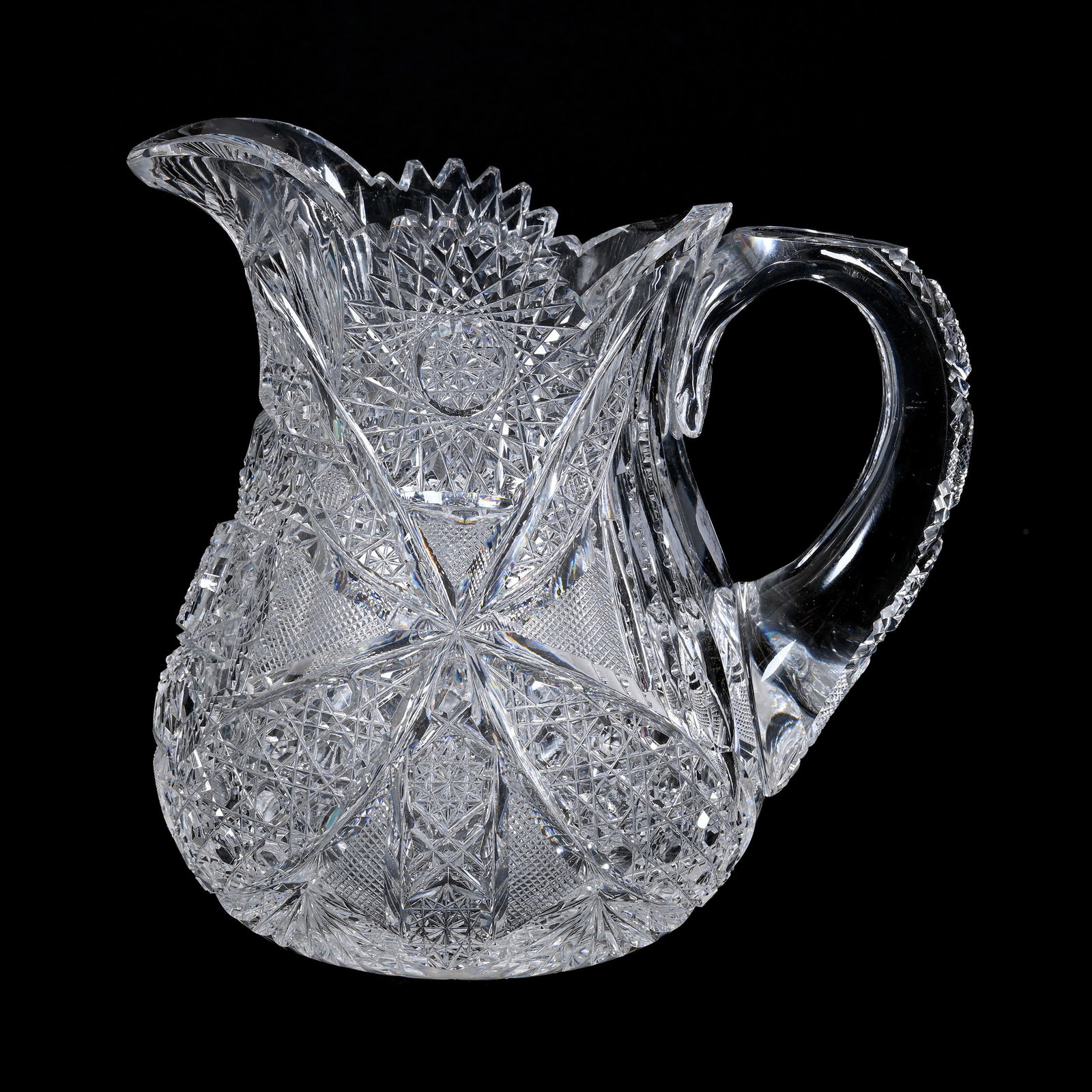 Pitcher, American Brilliant Cut Glass: Pitcher, American Brilliant Cut Glass, 7.5" x 8", Well Cut Hobstar, Vesica, Cane, Strawberry Diamond, Prism And Fan Motif, Pattern Cut Handle, Hobstar Base, Minimal Edge Roughness, Rim Chip, The Estat