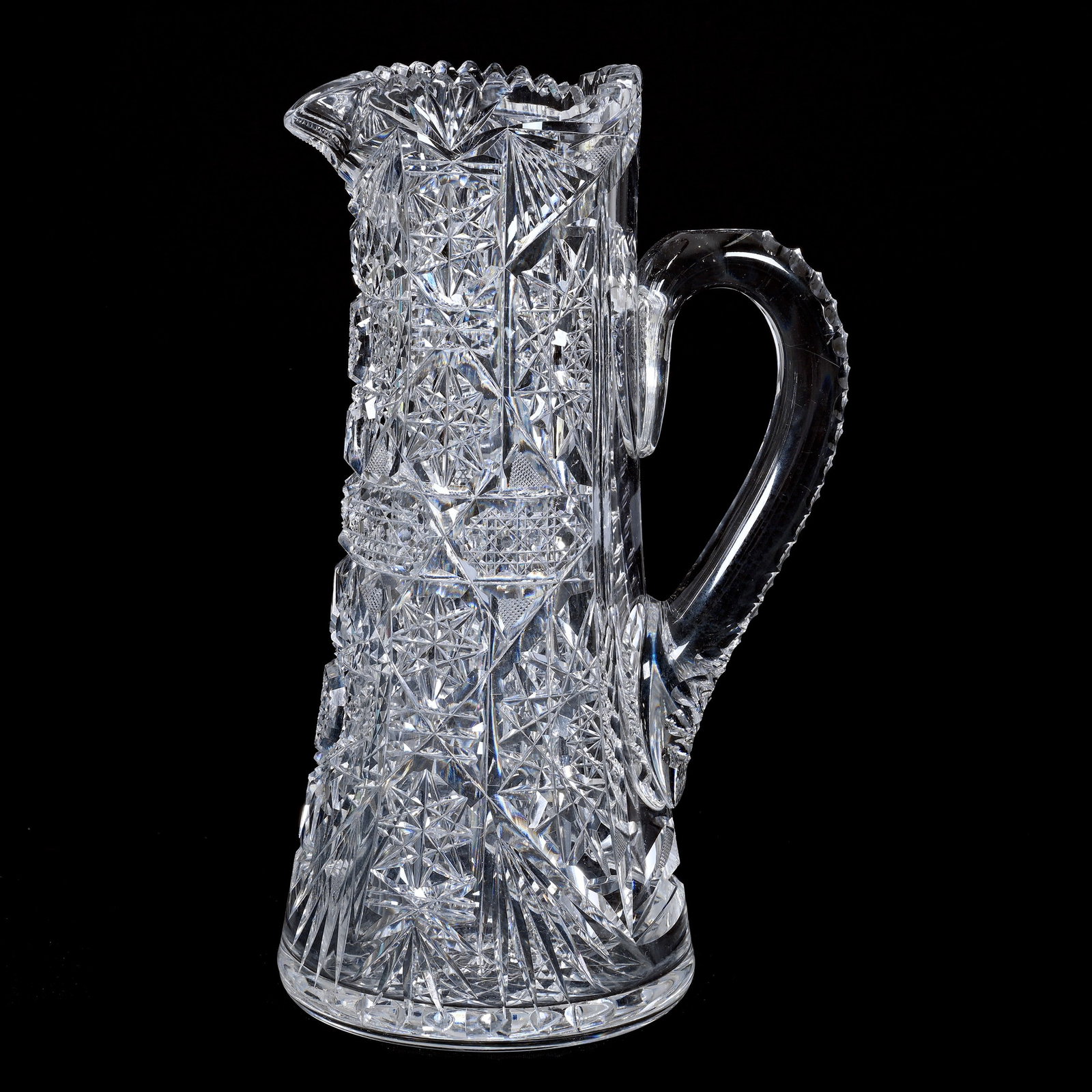 Tankard, American Brilliant Cut Glass: Tankard, American Brilliant Cut Glass, 11.25" x 6.75", Hobstar, Cane, Miter And Fan Motif, Triple Notched Handle, Hobstar Base, Clear Blank, The Estate Of Jean & Ralph Borelli.