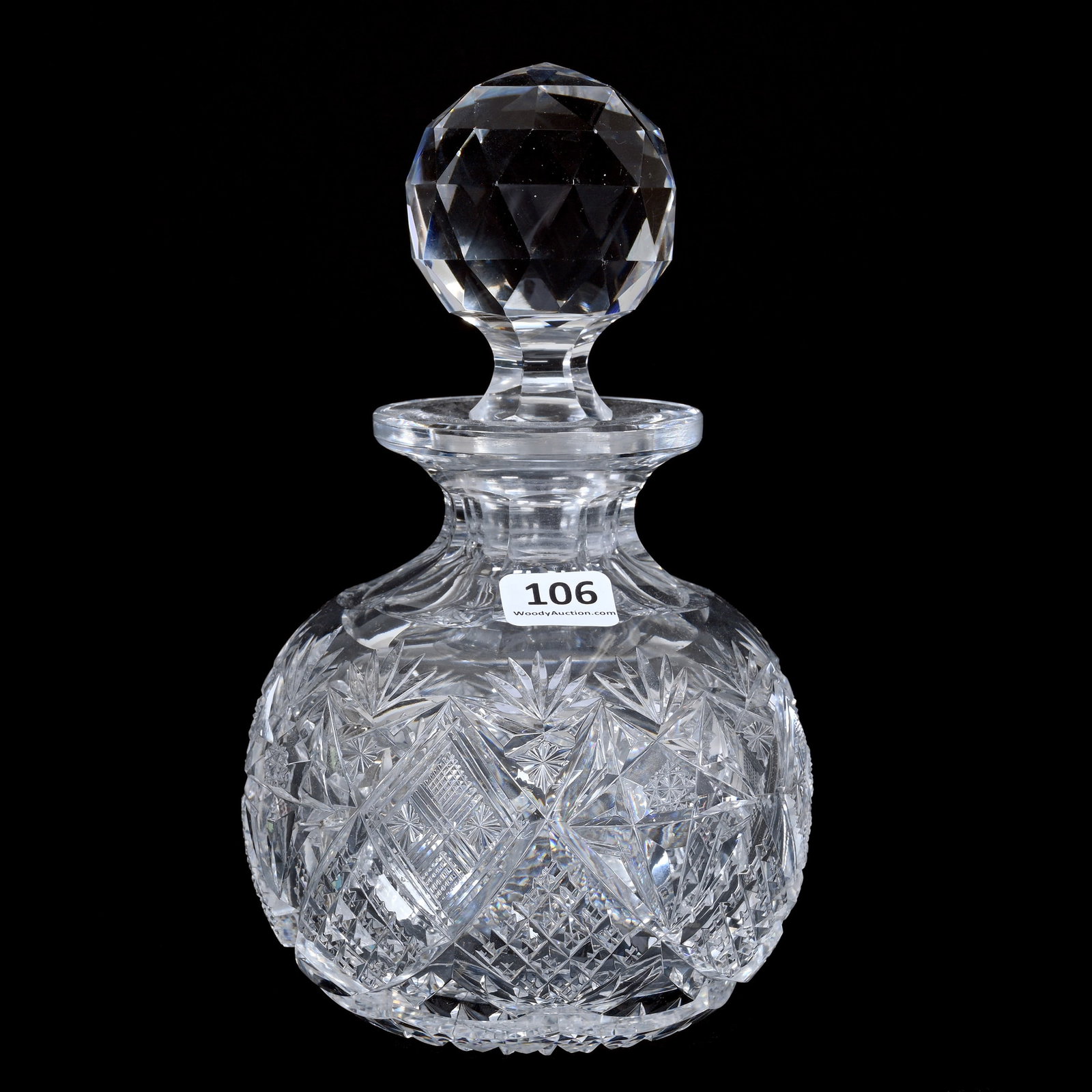Cologne Bottle, American Brilliant Cut Glass: Cologne Bottle, American Brilliant Cut Glass, 7.5" x 4.5", Hobstar, Crosscut Diamond, Strawberry Diamond, Star And Fan Motif, Hobstar Base, Nice Size, The Teddie And The Late Warren Biden Collection.