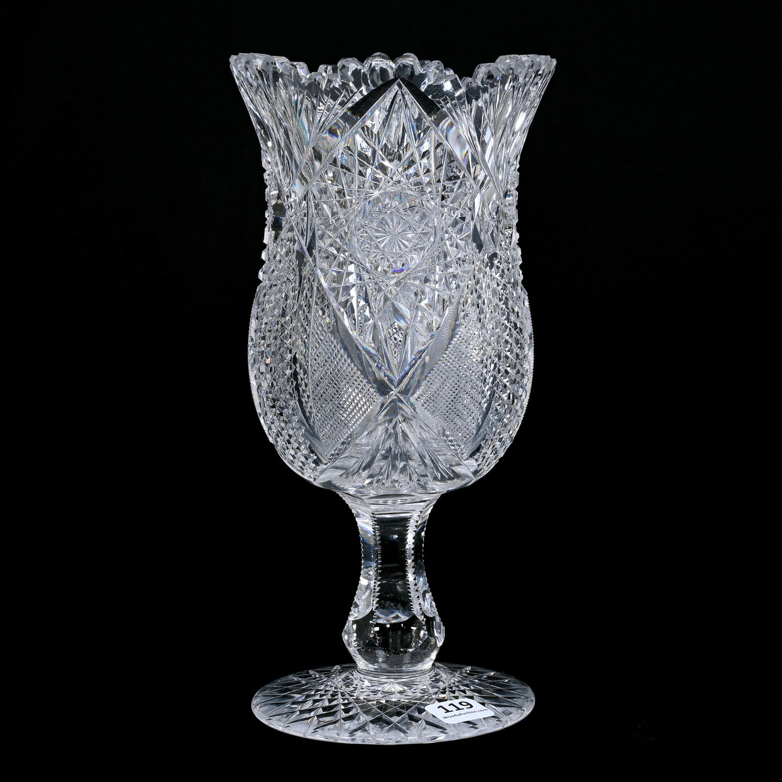 Pedestal Celery Vase, American Brilliant Cut Glass: Pedestal Celery Vase, American Brilliant Cut Glass, 9.75" x 4.75", Hobstar, Nailhead Diamond, Strawberry Diamond And Fan Motif, Hobstar Foot, One Tooth With Minor Rim Chip, The Estate Of Jean & Ralph 