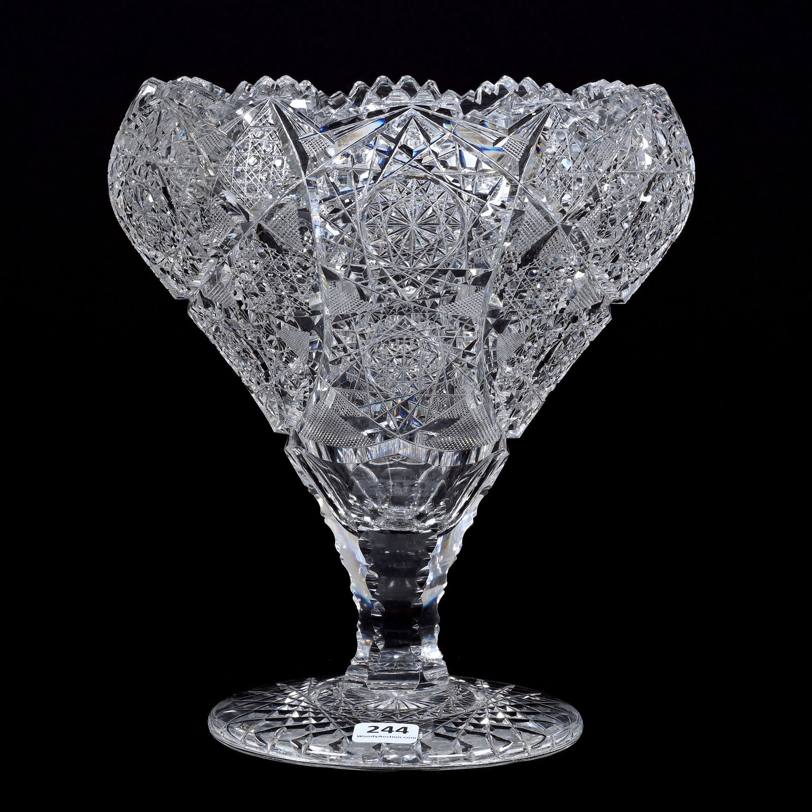 Tazza Vase, American Brilliant Cut Glass: Tazza Vase, American Brilliant Cut Glass, 9.25" x 8", Hobstar, Vesica, Cane And Strawberry Diamond Motif, Hobstar Foot, The Estate Of Jean & Ralph Borelli.