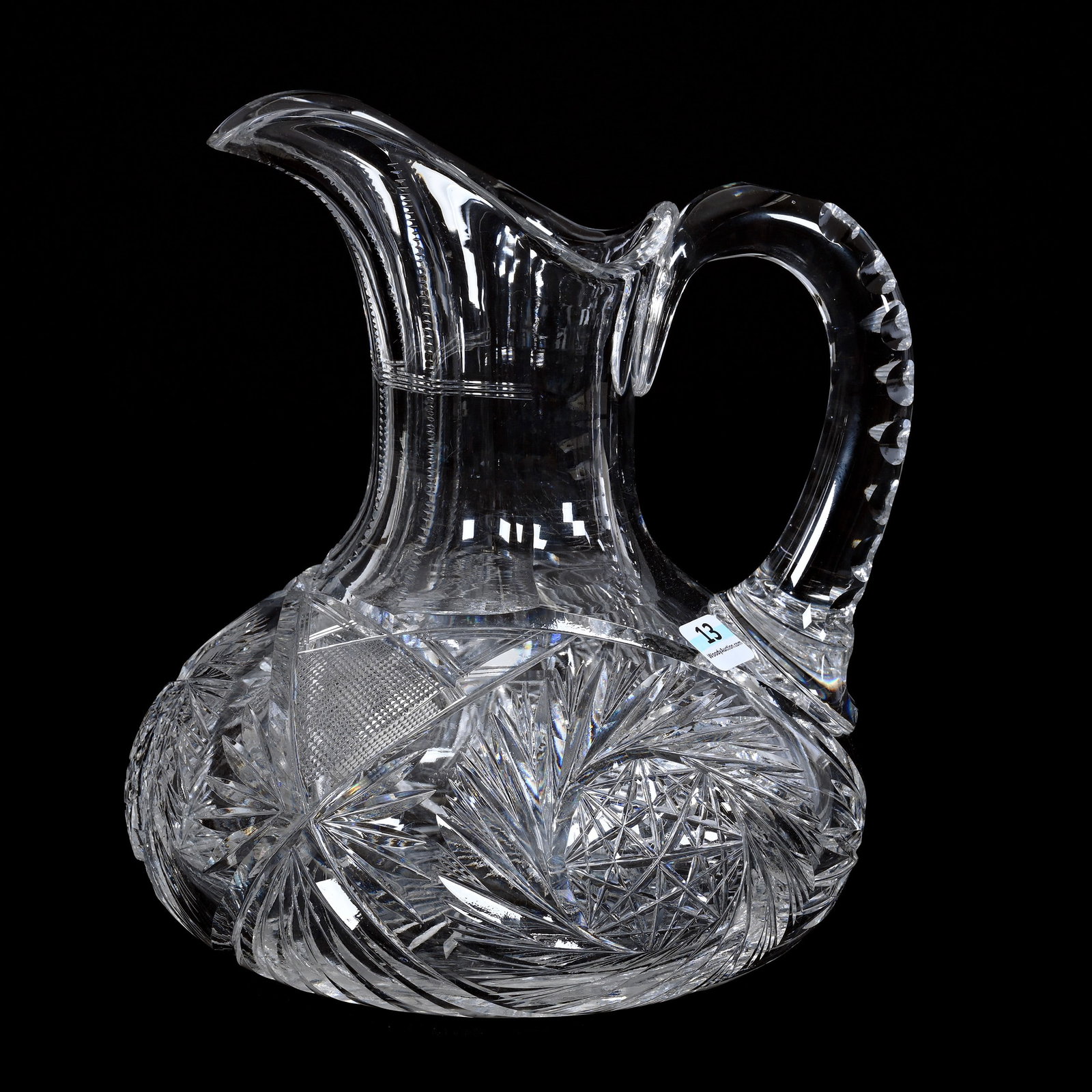 Pitcher, American Brilliant Cut Glass: Pitcher, American Brilliant Cut Glass, 9.5" x 8", Pinwheel, Strawberry Diamond And Fan Motif, Double Notched Handle, Ray Cut Base, Estate Of Jean & Ralph Borelli.