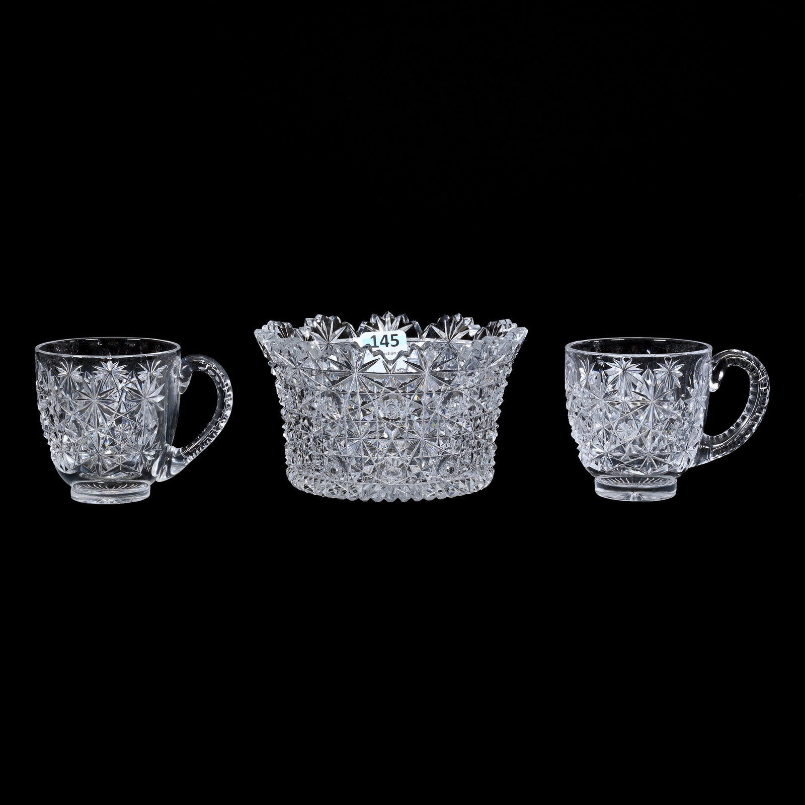 (3) Russian Pattern Items, American Brilliant Cut Glass: (3) Russian Pattern Items, American Brilliant Cut Glass, (1) 3" x 5" Bowl, Ray Cut Base, Persian Pattern, One Tooth Chip, (2) 2.75" x 3.5" Punch Cups, Star Cut Buttons, Estate Of Jean & Ralph Borelli.