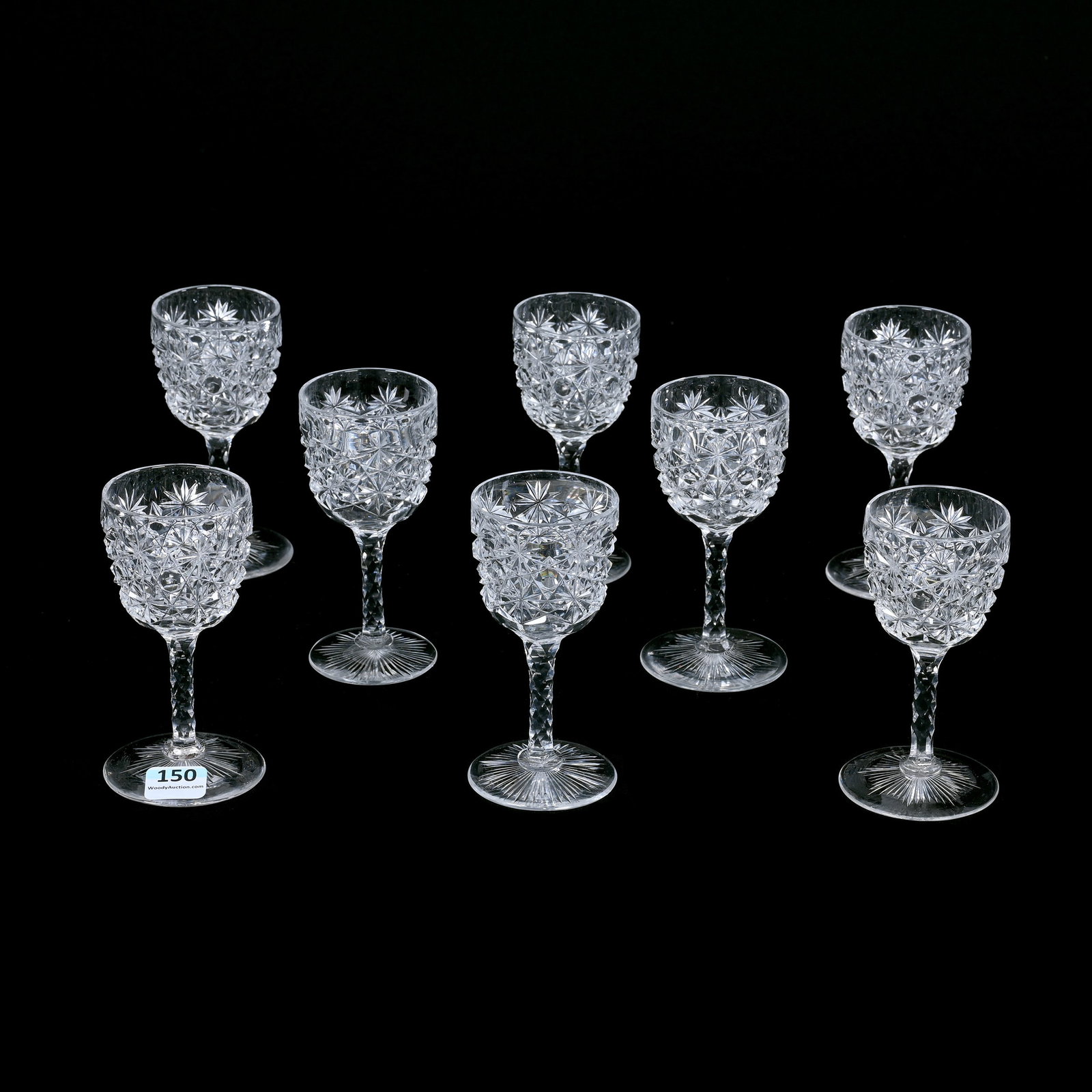 (8) Wine Stems, ABCG, Russian Pattern: (8) Wine Stems, American Brilliant Cut Glass, Russian Pattern, 4.5" x 2", Clear Cut Buttons, Diamond Cut Stem, Ray Cut Foot, One Has Possible Rim Touch-Up, Estate Of Jean & Ralph Borelli.