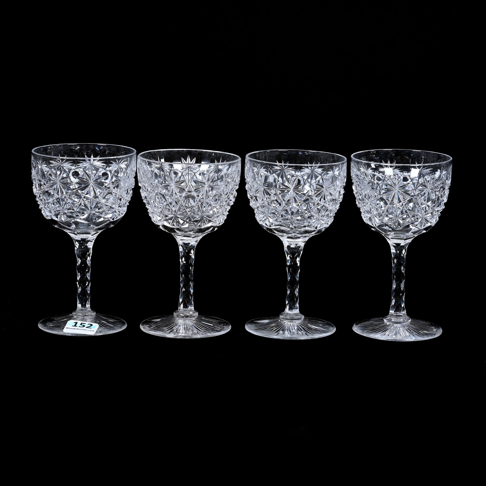 (4) Wine Stems, ABCG, Russian Pattern: (4) Wine Stems, American Brilliant Cut Glass, Russian Pattern, 5" x 2.75", Clear Cut Buttons, Diamond Cut Stem, Ray Cut Foot, One Has Possible Rim Touch-Up, Estate Of Jean & Ralph Borelli.