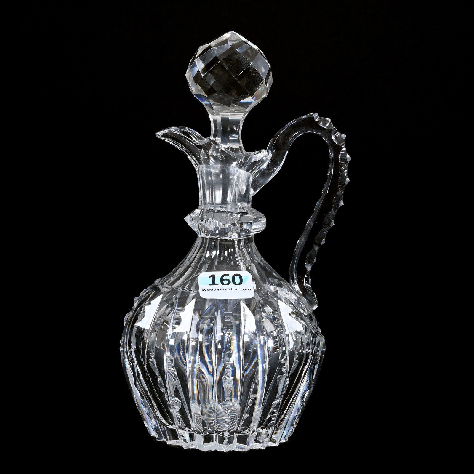 Cruet, American Brilliant Cut Glass: Cruet, American Brilliant Cut Glass, 6.75" x 3.5", Prism Cut Body, Facet Cut Ring Neck, Triple Notched Handle, Ray Cut Base, Sizable Pattern Chip, Estate Of Jean & Ralph Borelli.