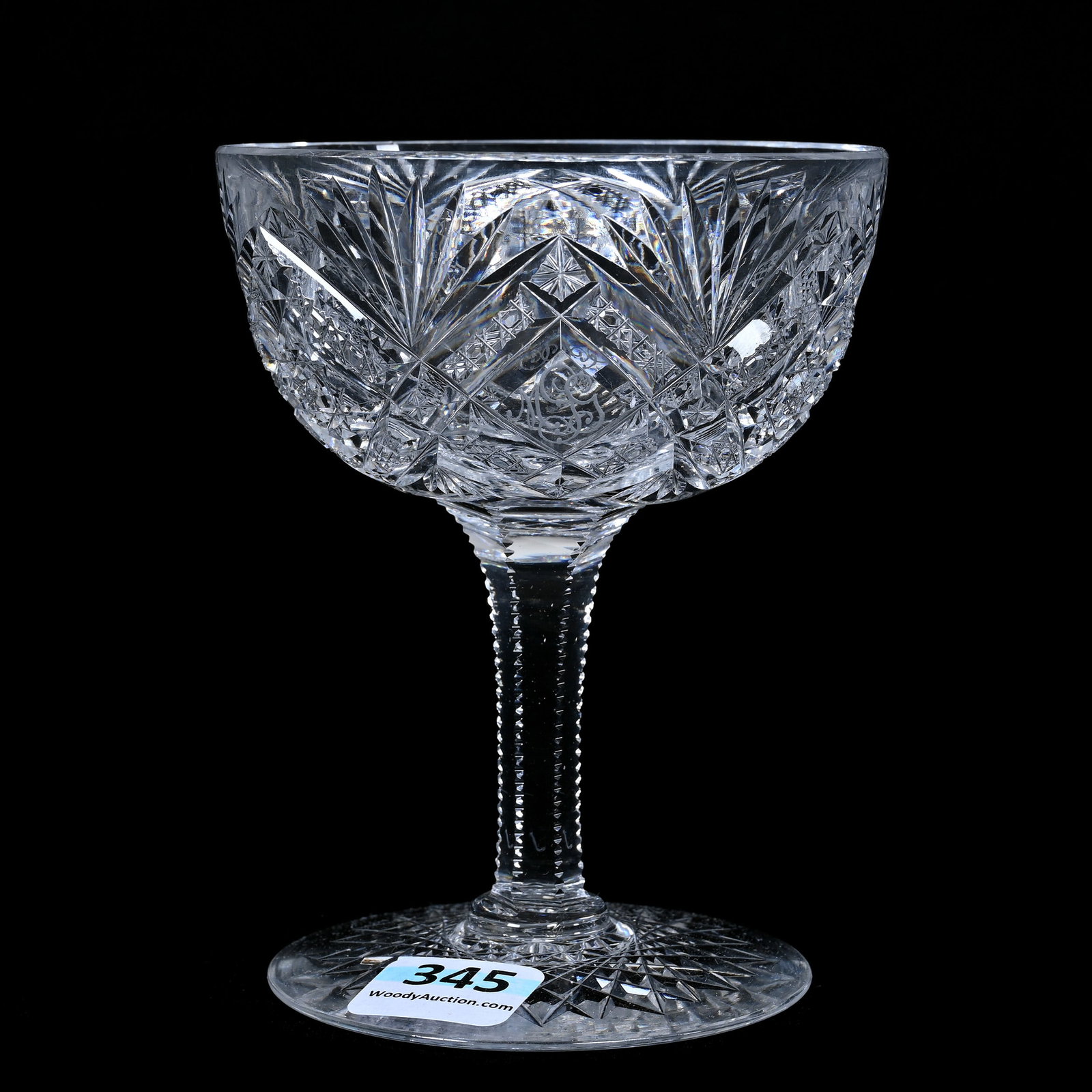 Champagne Stem, American Brilliant Cut Glass: Champagne Stem, American Brilliant Cut Glass, 4.5" x 3.5", Hobstar, Cane, Nailhead Diamond And Fan Motif, Engraved Monogram Window, Hobstar Foot, Missouri Private Collection.