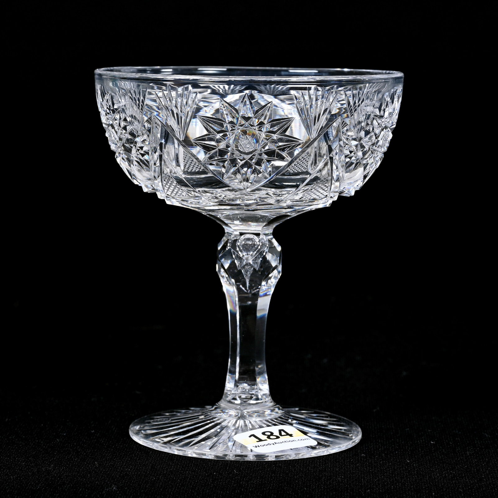 Champagne Stem, American Brilliant Cut Glass: Champagne Stem, American Brilliant Cut Glass, 4.5" x 3.75", Hobstar, Strawberry Diamond And Fan Motif, Teardrop Stem, Ray Cut Foot, Clear Blank, Ware Collection, Illinois.