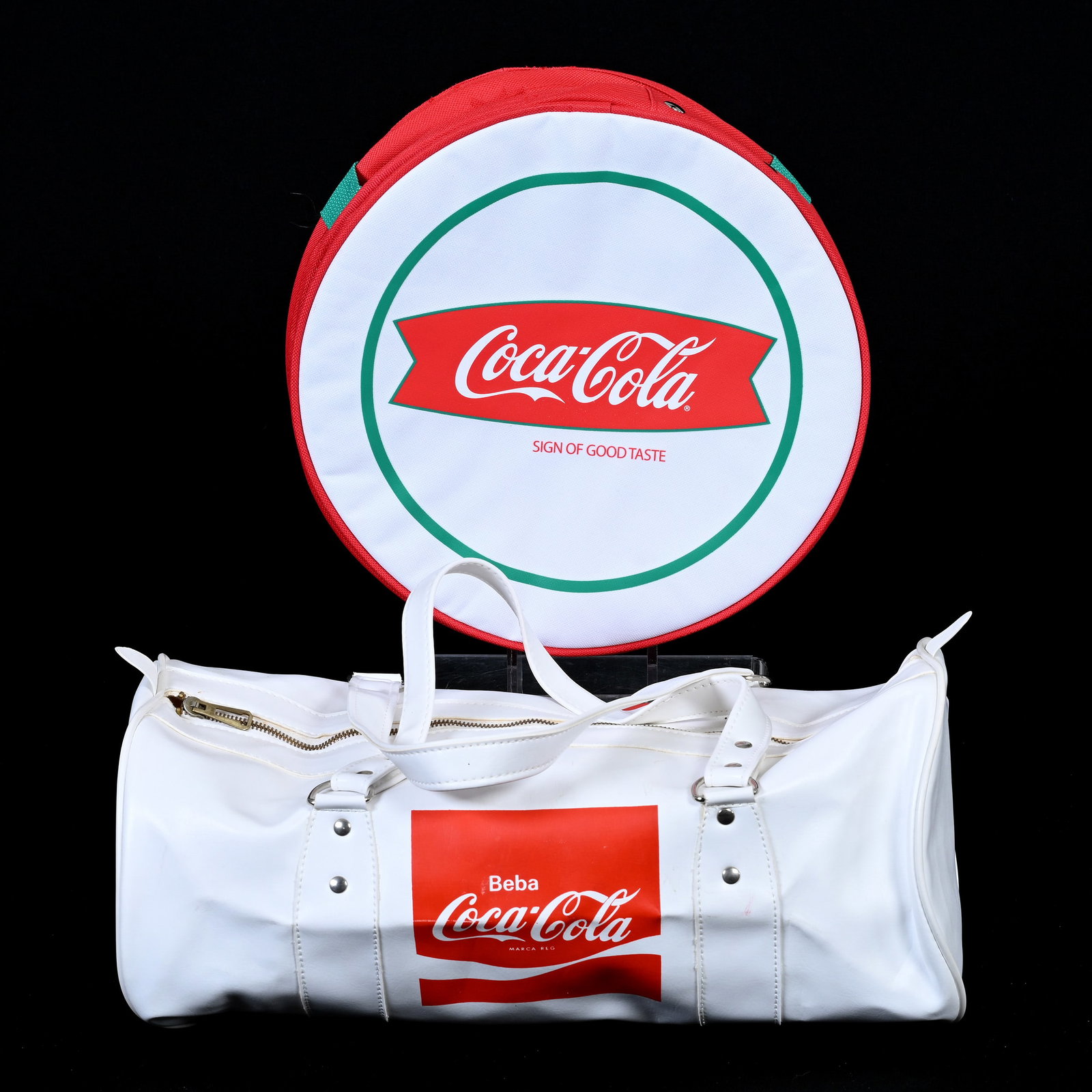 Coca-Cola Picnic Fishtail Bag & Vinyl Duffel Bag: Coca-Cola Picnic Fishtail Bag- Expandable & Vinyl Duffel Bag, 12" Diameter Picnic Bag Sells With Two Plates, 16" White Duffel "Bebe", Kansas Private Collection. UPDATED 5-23-24: Additional Information