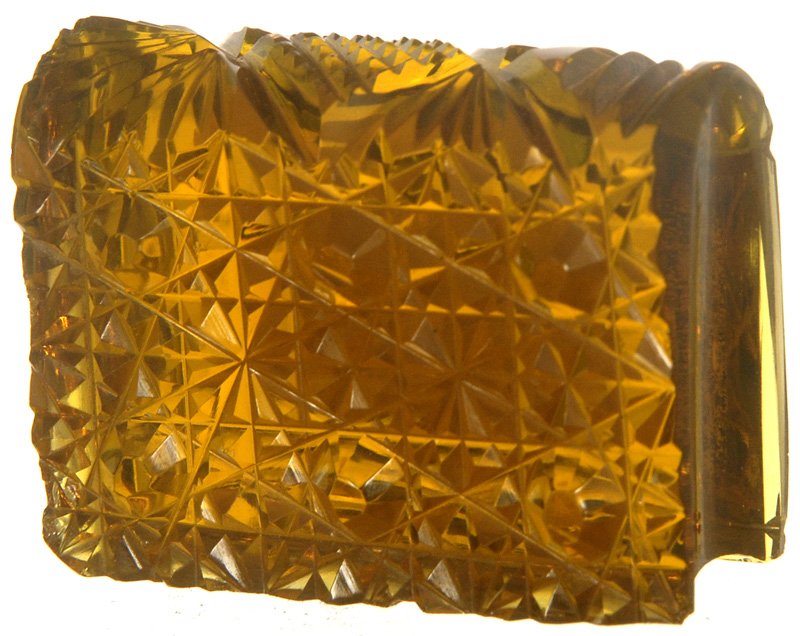 1 1/4" AMERICAN BRILLIANT CUT GLASS SOLID AMBER BO: 1 1/4" AMERICAN BRILLIANT CUT GLASS SOLID AMBER BOOK SHAPED PAPERWEIGHT RUSSIAN PATTERN ON COVER WITH PATTERN CUT SPINE - CUTE