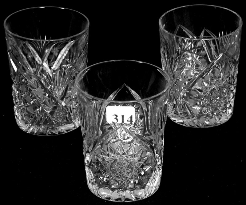 (3) 4 3/4" AMERICAN BRILLIANT CUT GLASS TUMBLERS: (3) 4 3/4" AMERICAN BRILLIANT CUT GLASS TUMBLERS HOBSTAR, FAN AND ENGRAVED LEAF MOTIF - one has been trimmed