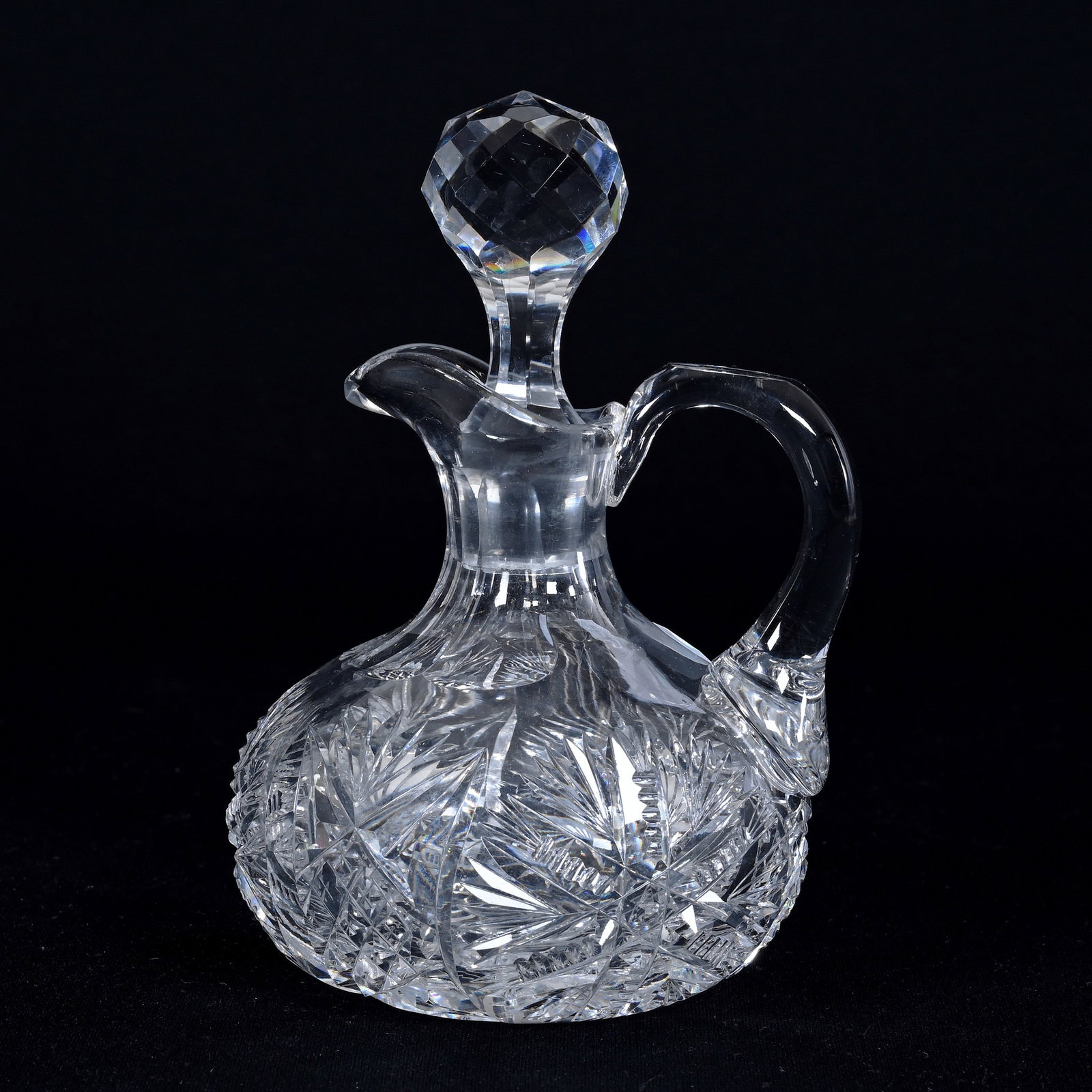 Cruet Bottle, American Brilliant Cut Glass: Cruet Bottle, American Brilliant Cut Glass, 6" x 3.75", Cross Bars And Starburst Design With Crosscut Diamond And Fan Highlights, Ray Cut Base, Patricia (Pat) Van Carpels Collection.