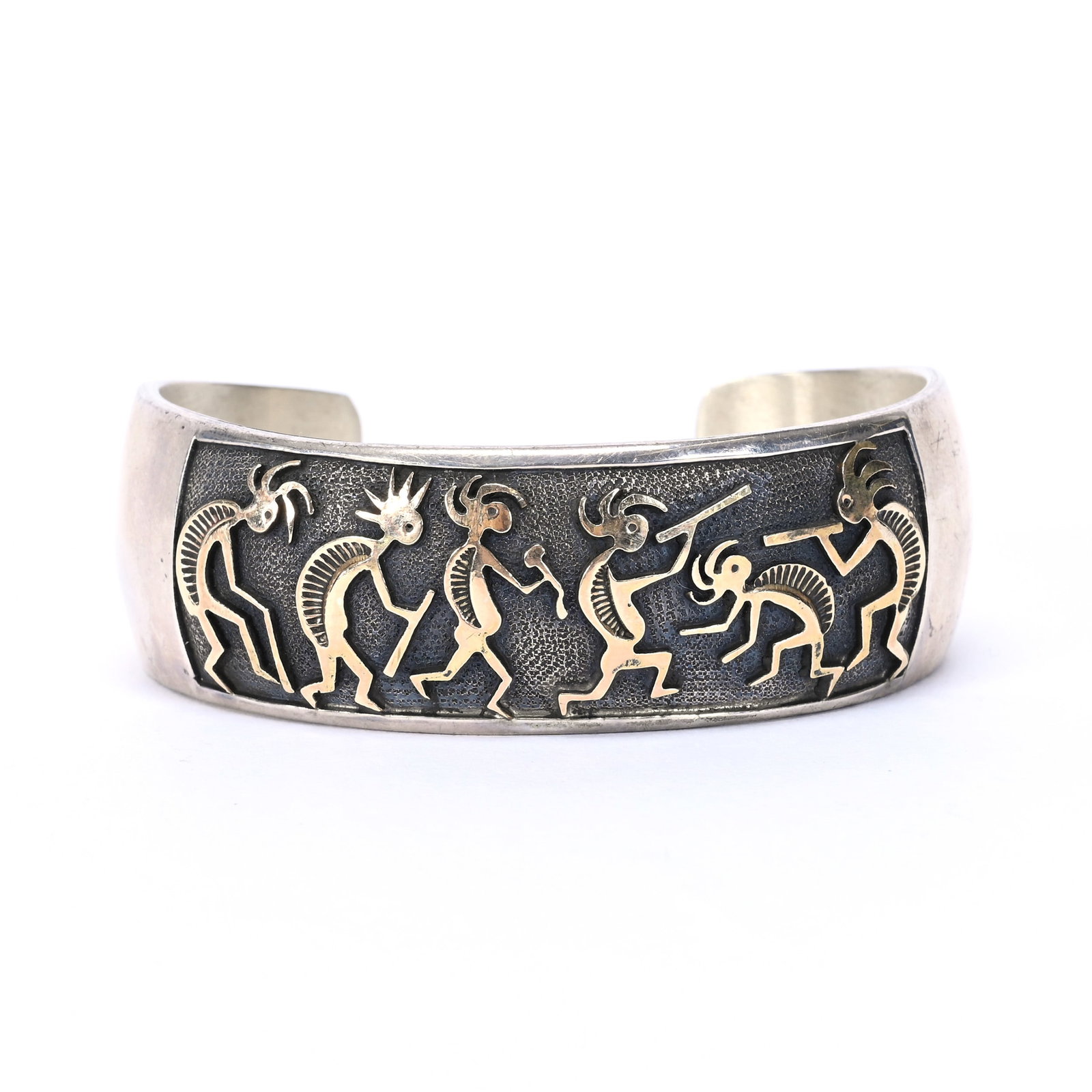 Bracelet, Sterling, 12k Gold Fill Kokopelli Design: Bracelet, Sterling, 12k Gold Fill Kokopelli Design, Zuni, Artist Signed "Mark Yazzie", Total Weight Of 40 Grams, Karin & The Late Dr. Ernest Rieger Collection.