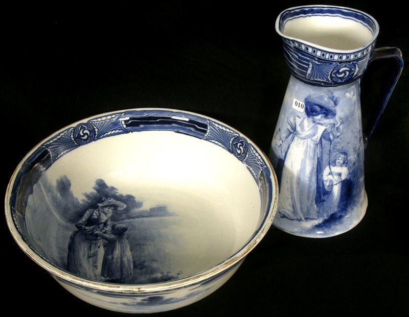 15" X 16" ROYAL DOULTON FLOW BLUE BABES IN WOODS PI: 15" X 16" ROYAL DOULTON FLOW BLUE BABES IN WOODS PITCHER & WASH BOWL SET AUBREY PATTERN - PITCHER FEATURES WOMAN WITH YOUNG GIRL HOLDING RIBBON - BOWL FEATURES WOMAN HOLDING BASKET WITH YOUNG GIRL REA