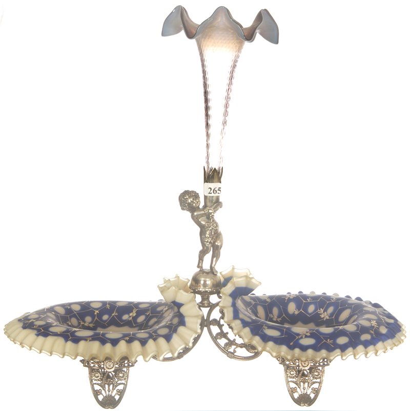 19" X 19" VICTORIAN DOUBLE BRIDES BASKET WITH CENT: 19" X 19" VICTORIAN DOUBLE BRIDES BASKET WITH CENTER EPERGNE LILY PAIR OF COBALT BLUE AND CREAM CASED ART GLASS JACK IN PULPIT SHAPED BOWLS SET ON FANCY TUFTS SILVERPLATE FIGURAL FRAME FEATURING CHERU