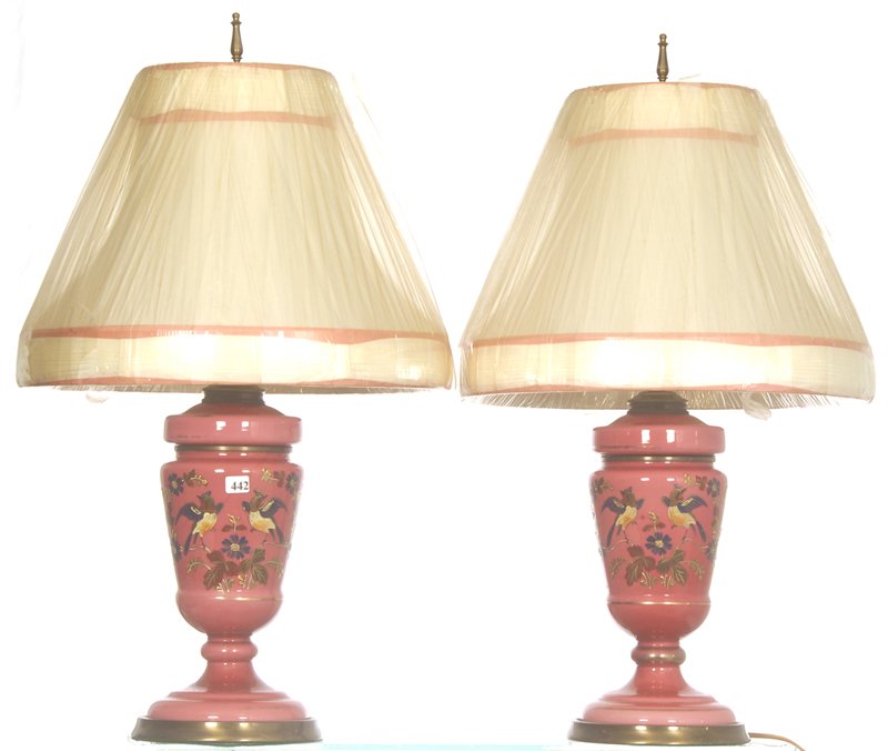 PAIR 25" (TO TOP OF SHADE) DECORATIVE TABLE LAMPS: PAIR 25" (TO TOP OF SHADE) DECORATIVE TABLE LAMPS PINK CASED ART GLASS BASES WITH ENAMEL TROPICAL BIRD AND FLORAL DECOR - WHITE FABRIC SHADES WITH PINK HIGHLIGHTS - OLD CELLOPHANE WRAP ON SHADES