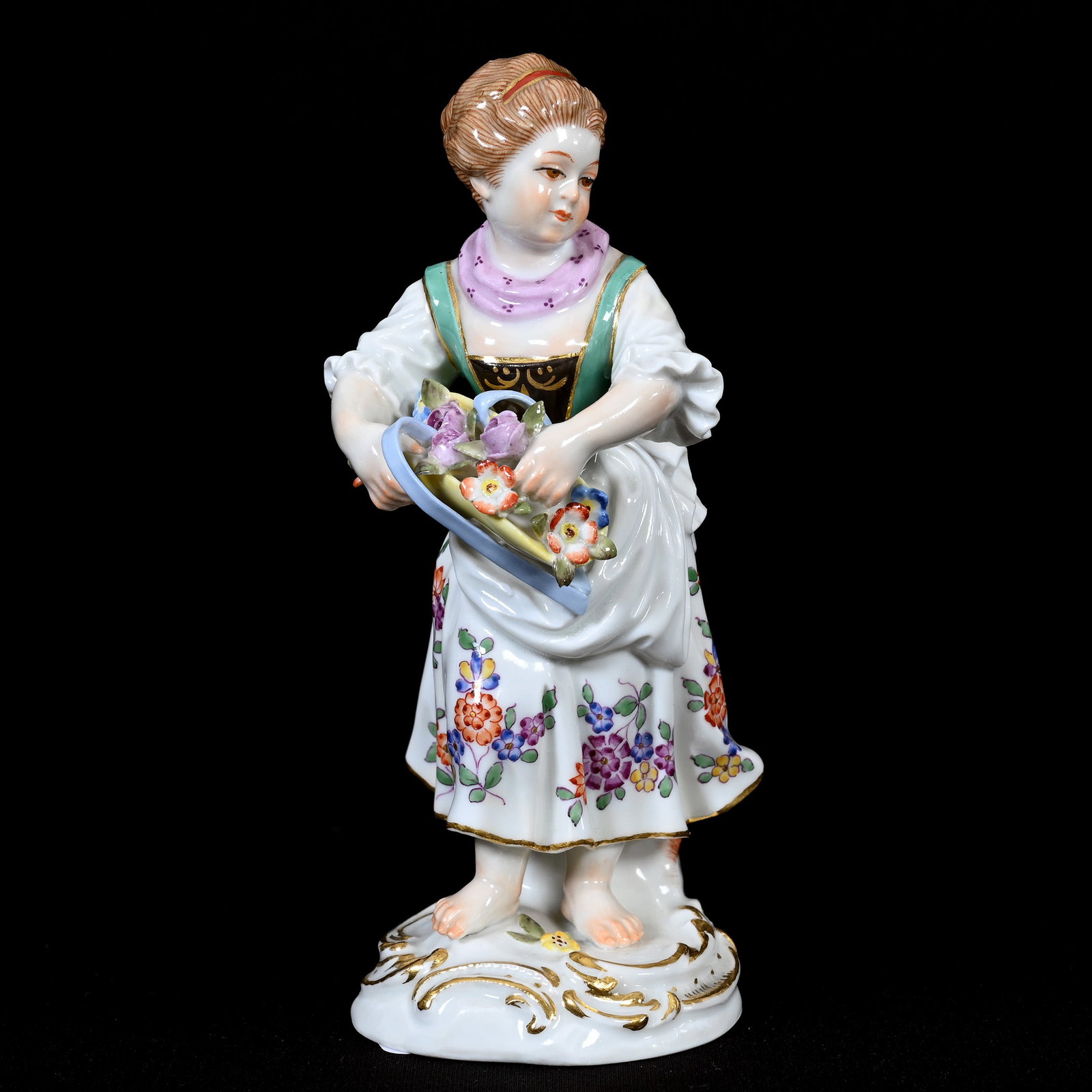 Figurine, Meissen Blue Crossed Swords Mark: Figurine, Meissen Blue Crossed Swords Mark, 5" x 2", Young Girl Holding Flowers In Hat, Incised "7", Frank Cox Estate, Denver, Colorado.