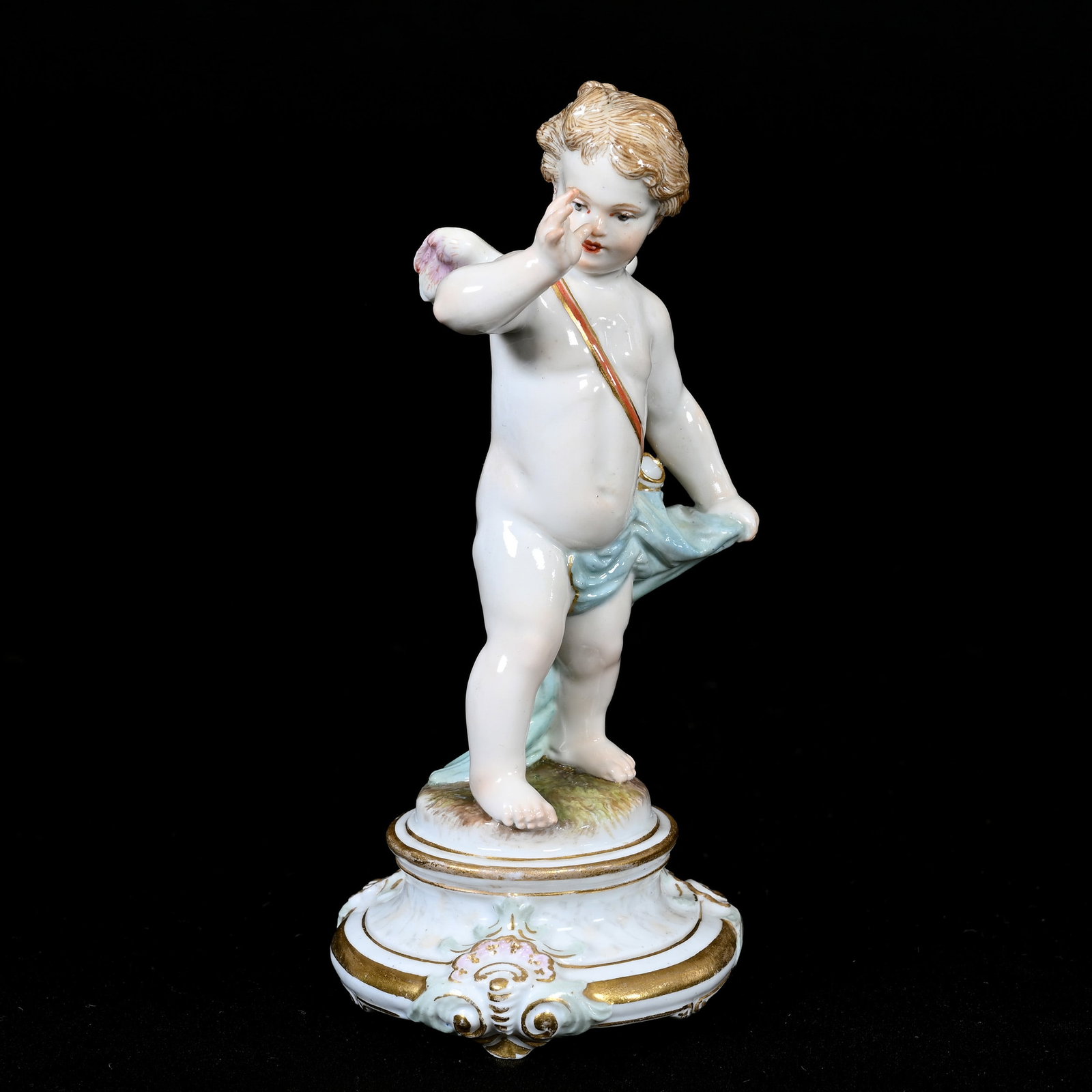 Figurine, Meissen Blue Crossed Swords Mark: Figurine, Meissen Blue Crossed Swords Mark, 5.25" x 2.5", Naughty Cherub, Incised "M101", Frank Cox Estate, Denver, Colorado.