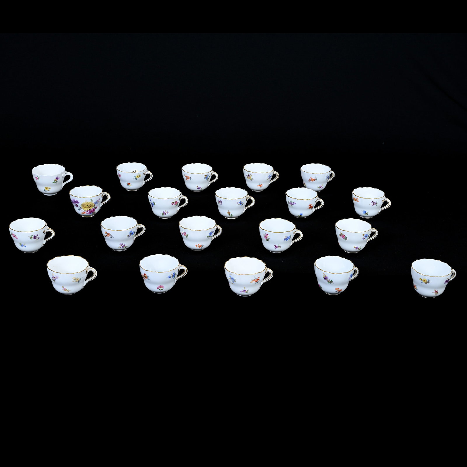 (20) Demitasse Cups, Meissen Blue Crossed Swords: (20) Demitasse Cups, Meissen Blue Crossed Swords, 2" x 3", Most Are Strewn Flowers Pattern, One Cup Slightly Different, Size Of One Is Slight Variation, Frank Cox Estate, Denver, Colorado.