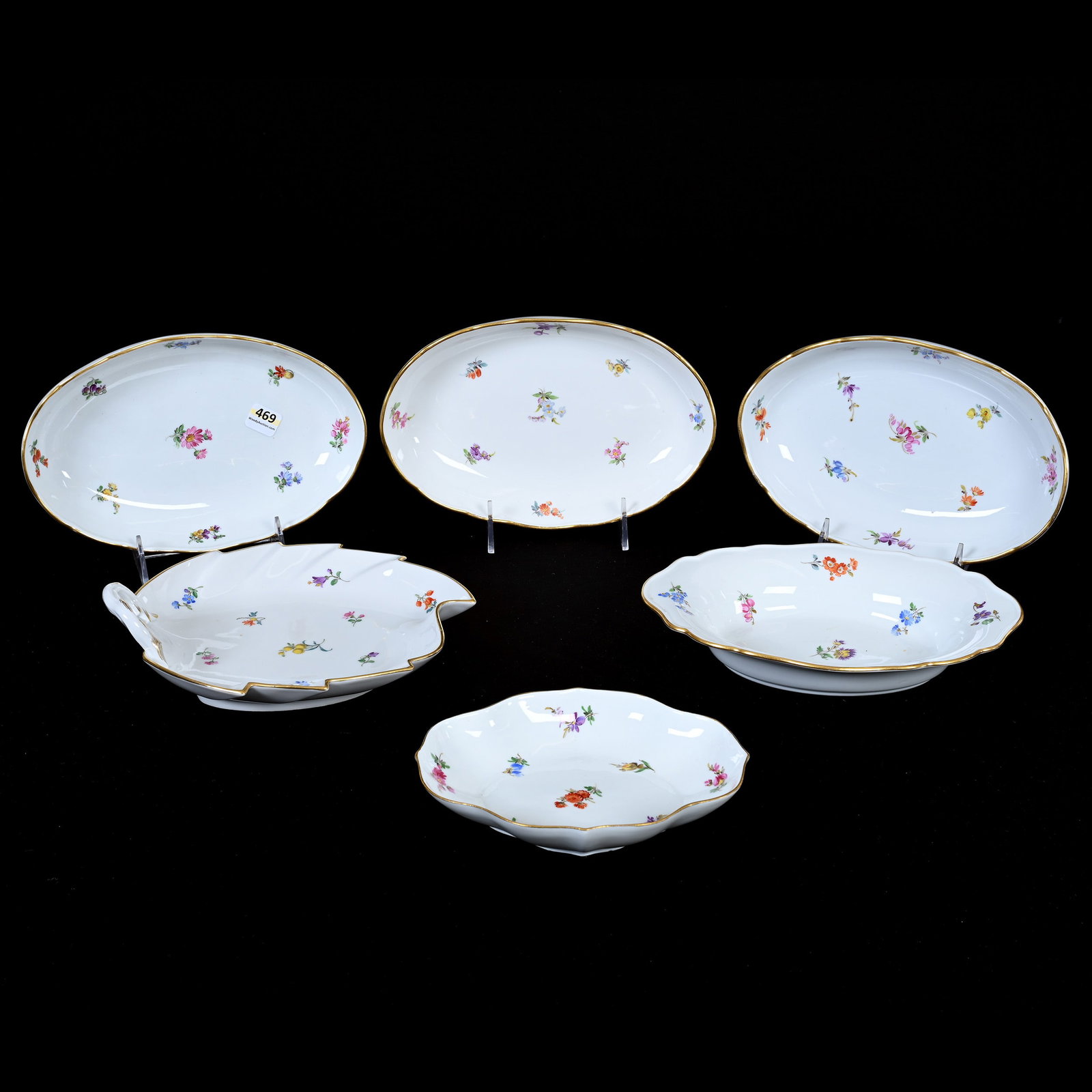 (6) Oval Dishes, Meissen Blue Crossed Swords Mark: (6) Oval Dishes, Meissen Blue Crossed Swords Mark, Strewn Flowers Pattern, (3) 9" Dishes, (1) 8.75" Leaf Shaped Dish W/Handle, (1) 9.25" Dish, (1) 7" Dish, Frank Cox Estate, Denver, Colorado.