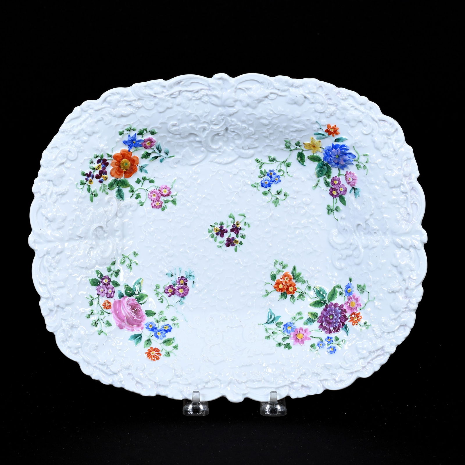 Oval Bowl, Meissen Blue Crossed Swords Mark: Oval Bowl, Meissen Blue Crossed Swords Mark, 11.5" x 9.5", Elaborate Embossed Scroll And Floral Design With Color Highlights, Frank Cox Estate, Denver, Colorado.