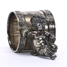 Figural Napkin Ring, Putti Wearing Hat