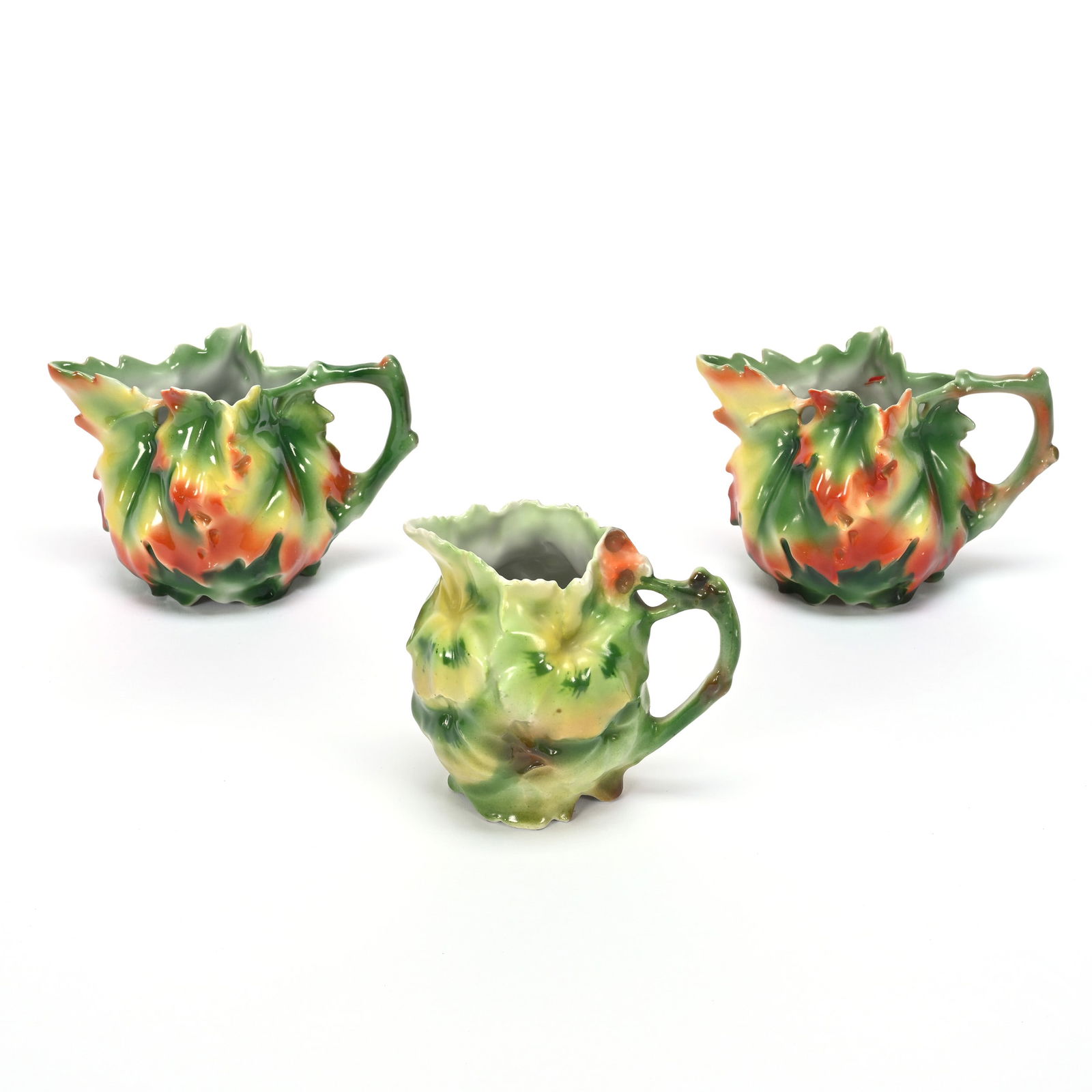 (3) Leaf Mold Creamers, Royal Bayreuth Blue Mark: (3) Leaf Mold Creamers, Royal Bayreuth Blue Mark, (1) 3.75" X 4.25" Geranium, (2) 3.25" X 5" Maple Leaf, Private Illinois Collection.
