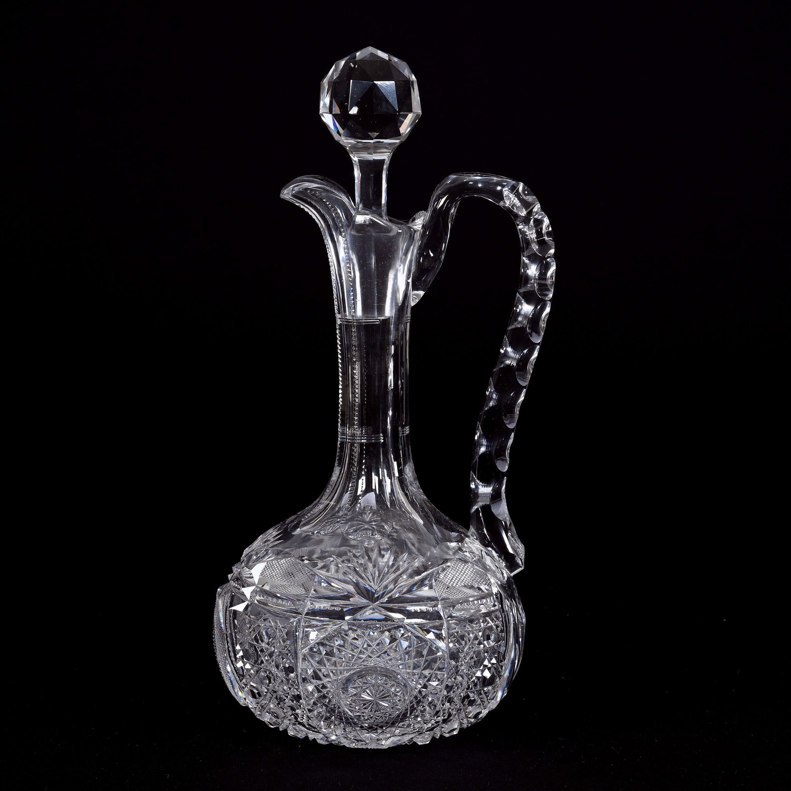 Decanter, Handled, American Brilliant Cut Glass: Decanter, Handled, American Brilliant Cut Glass, 12.5" x 5.5", Four Sections Of Hobstar, Shield, Cane, Strawberry Diamond, Prism And Fan Motif, Double Notched Handle, Private Illinois Collection.