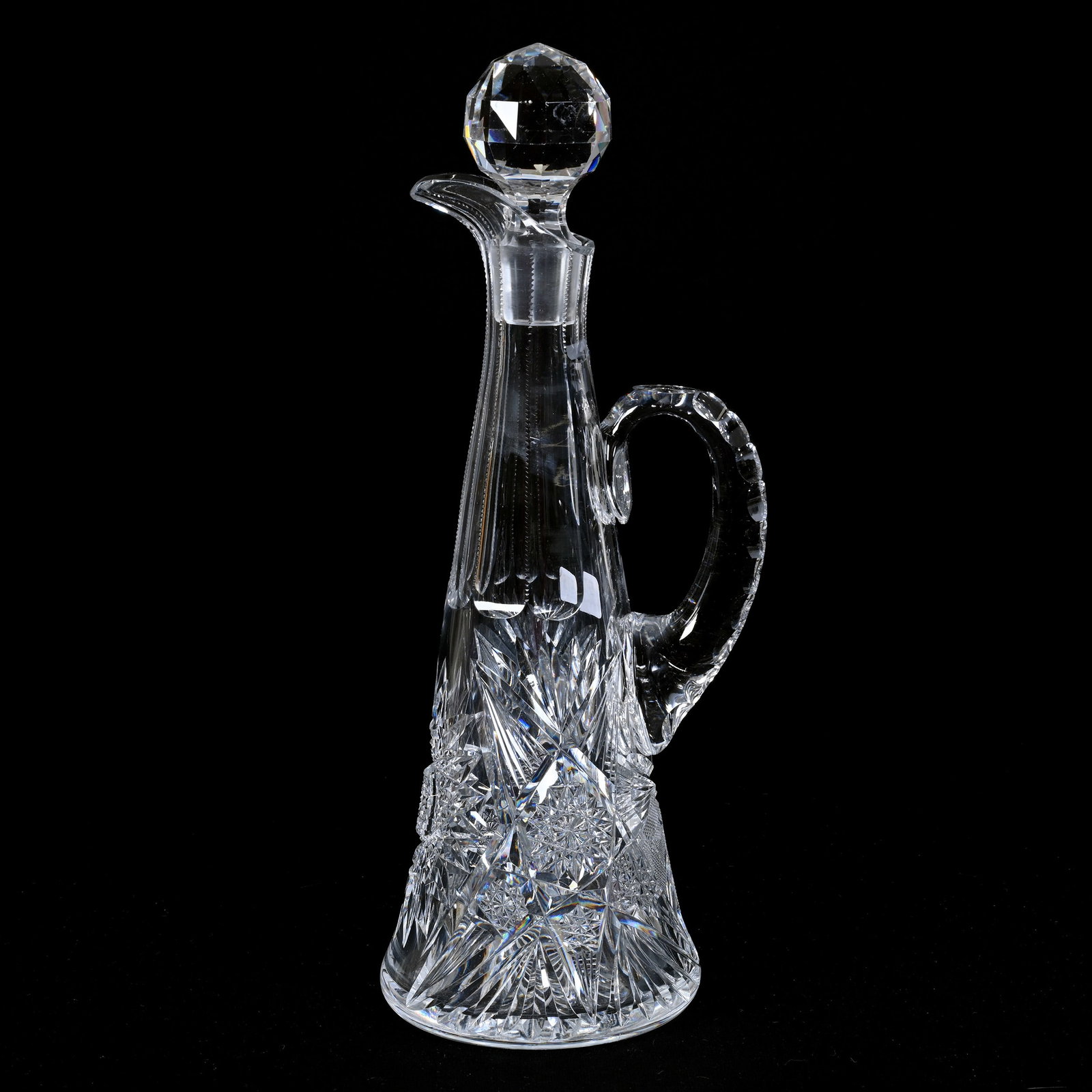 Decanter, Handled, American Brilliant Cut Glass: Decanter, Handled, American Brilliant Cut Glass, 14.75" x 5", Hobstar, Strawberry Diamond And Fan Motif, Double Notched Handle, Ray Cut Base, Two Stopper Nicks, Private Illinois Collection.
