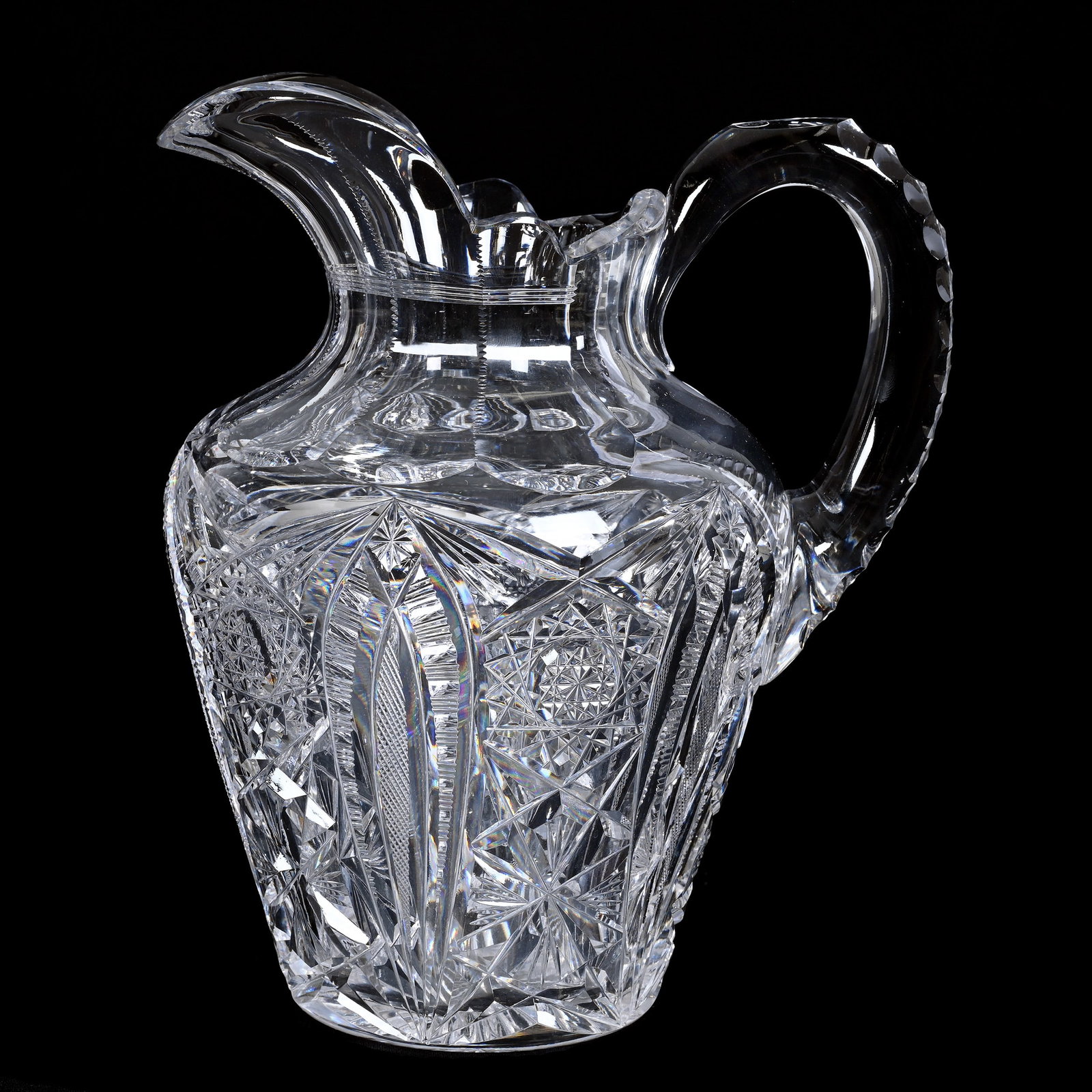 Pitcher, American Brilliant Cut Glass, By Almy & Thomas: Pitcher, American Brilliant Cut Glass, By Almy & Thomas, 9" x 7.5", Hobstar, Vesica, Strawberry Diamond, Zipper, Star And Fan Motif, Triple Notched Handle, Ray Cut Base, Steve Hollis Collection, VA.