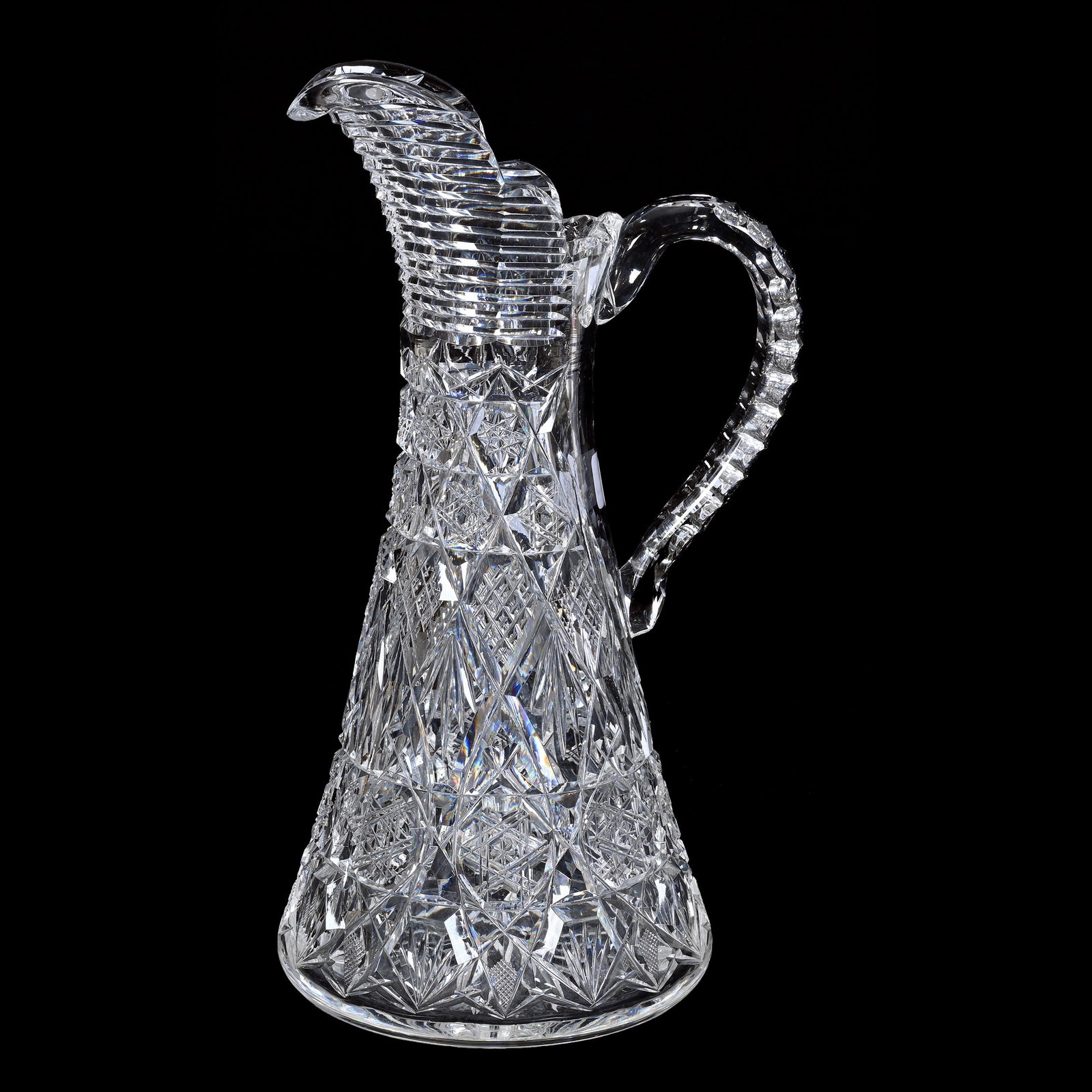 Tapered Pitcher, American Brilliant Cut Glass: Tapered Pitcher, American Brilliant Cut Glass, 12" x 6", Vesica, Geometric Hobstars, Crosscut Diamond And Fan Motif, Step Cut Spout, Triple Notched Handle, Ray Cut Base, Hard To See Handle Crack, Stev