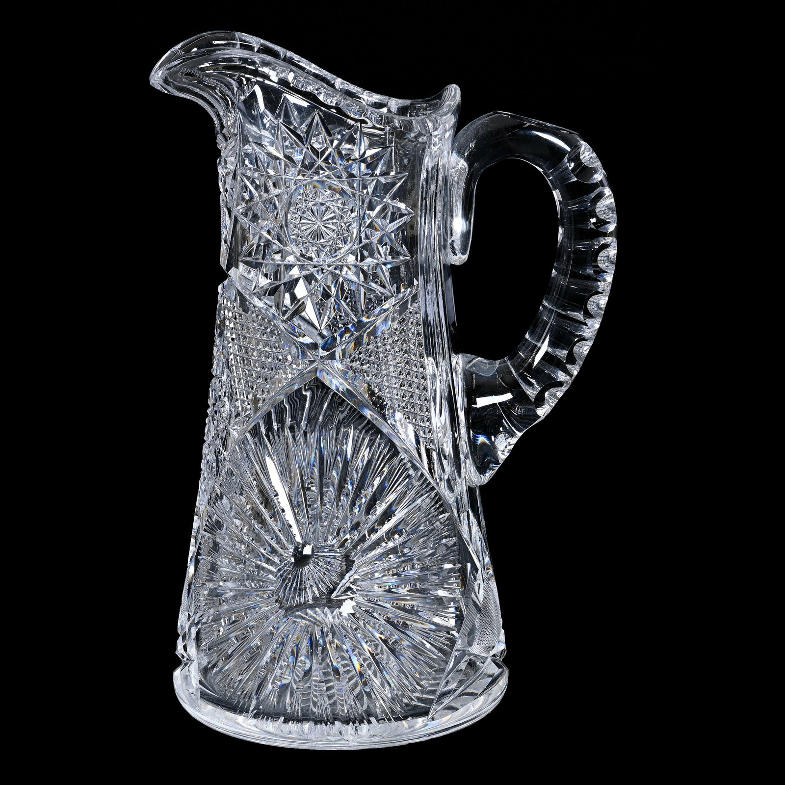 Pitcher, American Brilliant Cut Glass: Pitcher, American Brilliant Cut Glass, 10.75" x 7.25", Hobstar, Nailhead Diamond And Sunburst Motif, Double Notched Handle, Ray Cut Base, Spout Bruise, Steve Hollis Collection, VA.