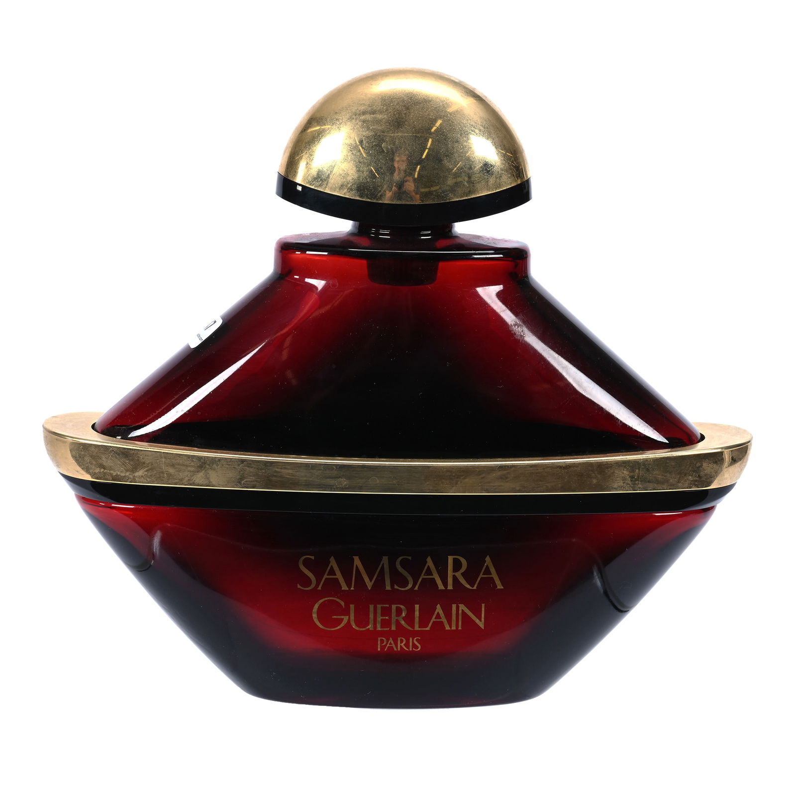 Display Perfume Bottle, Samsara Guerlain Paris: Display Perfume Bottle, Samsara Guerlain Paris, 10.5" x 11.75", Solid Ruby Bottle With Gilded Highlights, Bottle Only, Collection Of The Late Bunny Koppelman.