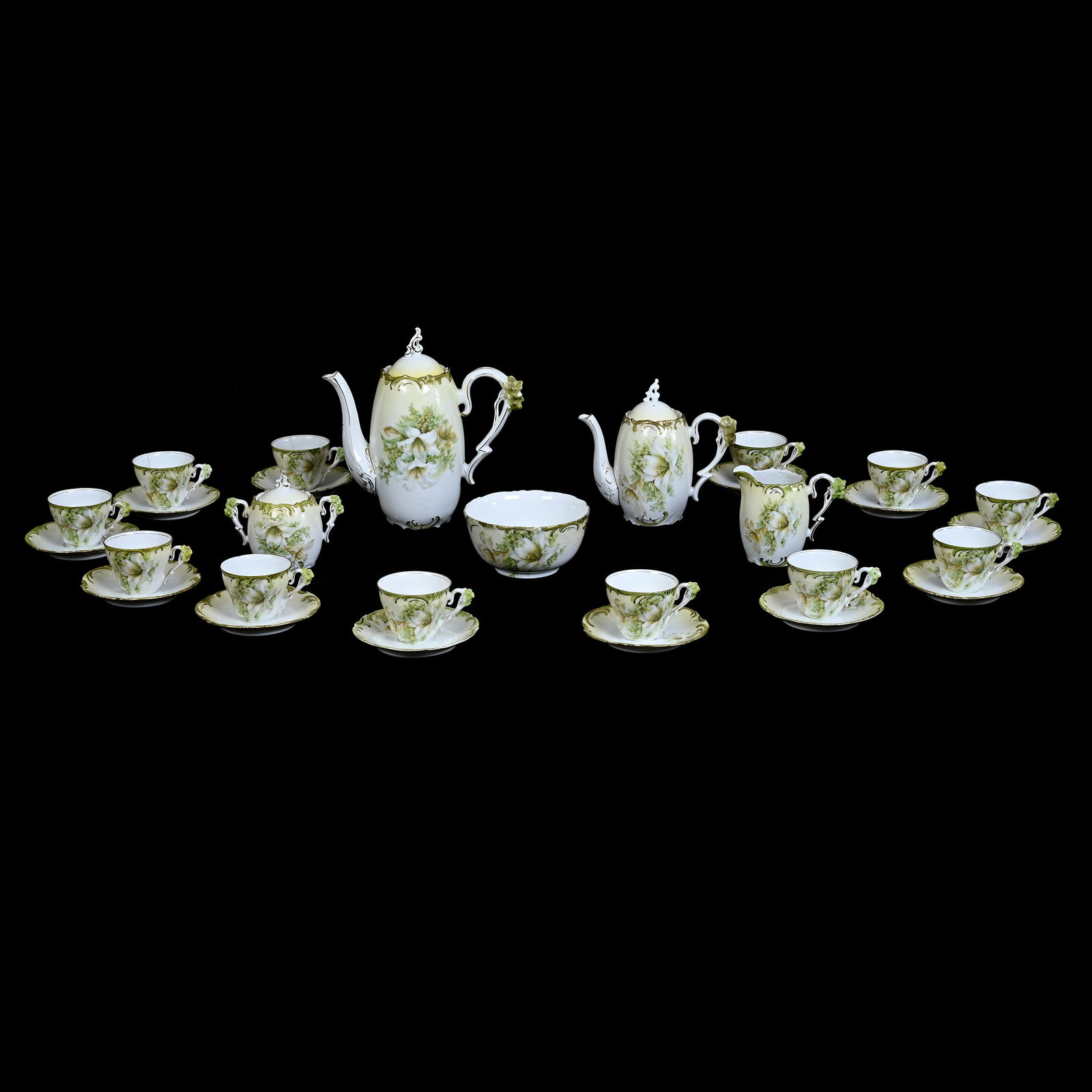 Coffee & Tea Service, Unmarked, (17) Piece Set: Coffee & Tea Service, Unmarked, (17) Piece Set, Cream, Green And White Tones, White Lily Decor, Set Includes (1) 9" x 9" Coffee Pot, Serious Handle Repair, (1) 6.5" x 7.25" Tea Pot, (1) Creamer & Suga