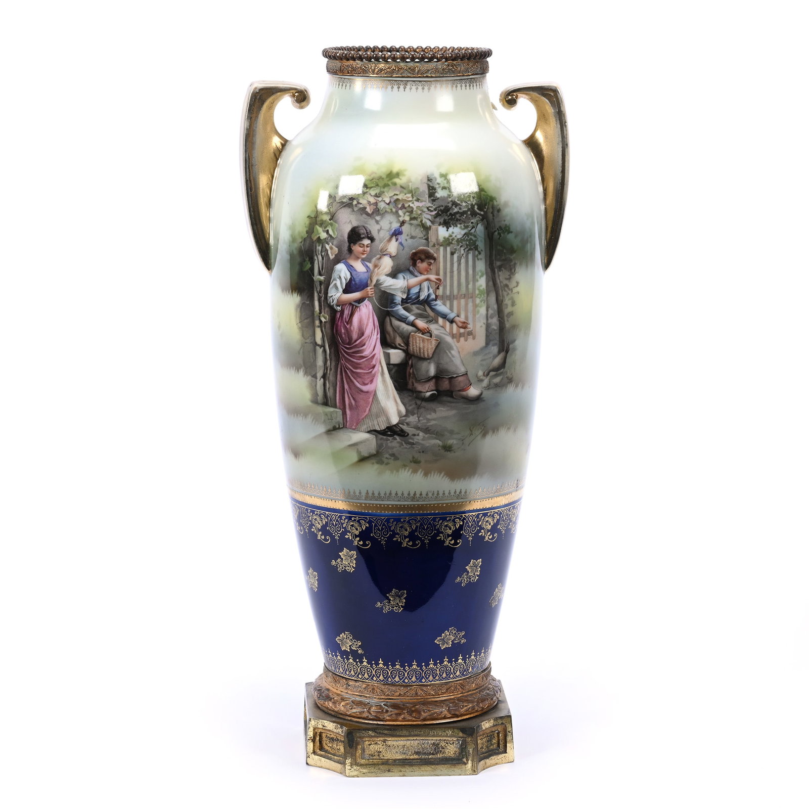 Vase Marked R. S. Suhl, Scenic: Vase Marked R. S. Suhl, Scenic, 16" x 7.25", Green, Blue And Yellow Ground, Scene Of Two Women Courtyard With Chicks And Yarn, Cobalt Blue Border, Gold Stencil Highlights, Metal Rim And Attached Metal