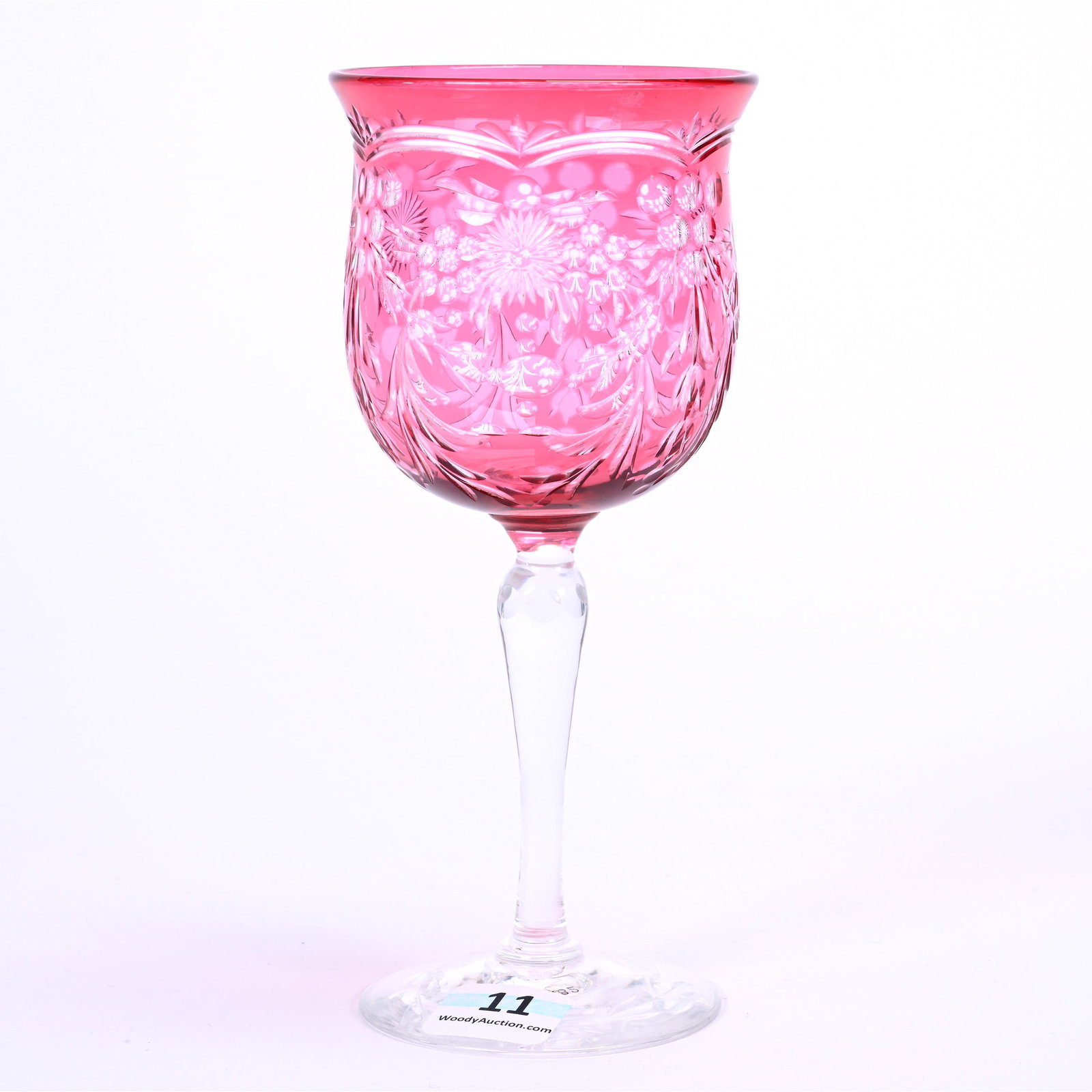 Wine Stem, BPCG, Cranberry Cut To Clear, Signed Webb Corbett: Wine Stem, Brilliant Period Cut Glass, Cranberry Cut To Clear, Signed Webb Corbett, 6.25" x 2.75", Engraved Floral Pattern With Pattern Engraved Foot, American Cut Glass Association Collection.