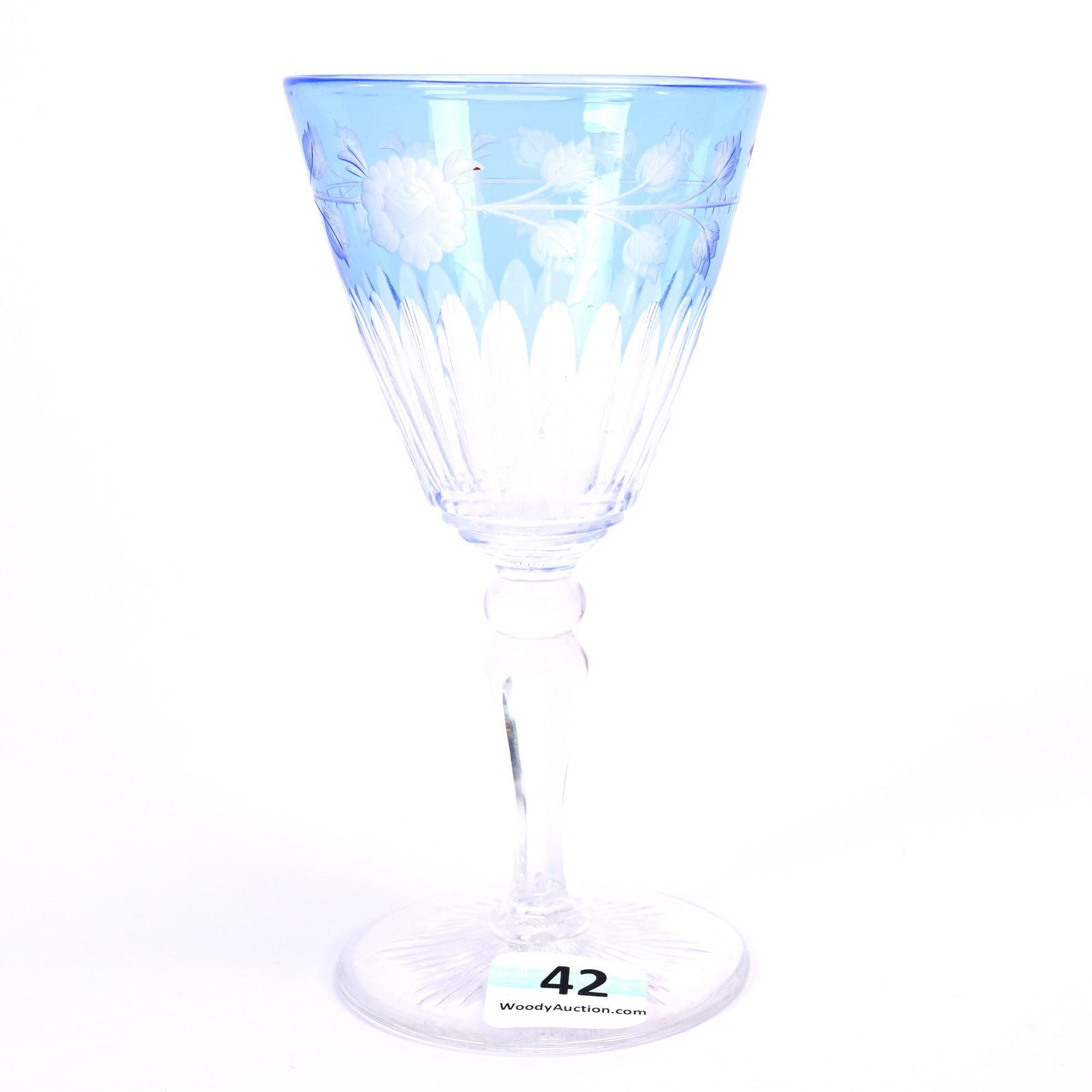 Wine Stem, ABCG, Pale Blue Cut To Clear, Engraved Rose Decor With Channel Cut Highlights: Wine Stem, American Brilliant Cut Glass, Pale Blue Cut To Clear, Engraved Rose Decor With Channel Cut Highlights, 5" x 2.5", Ray Cut Foot, American Cut Glass Association Collection.