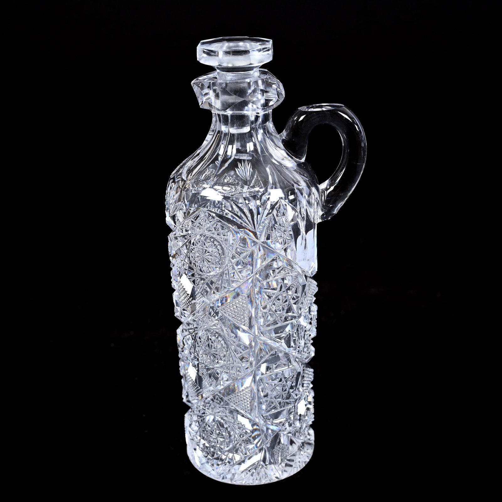 Bottle With Handle, American Brilliant Cut Glass, Well Cut Monarch Pattern By J. Hoare: Bottle With Handle, American Brilliant Cut Glass, Well Cut Monarch Pattern By J. Hoare, 7.25" x 3", Small Edge Nick On Stopper, Linda & The Late Gary Maddox Collection, NC.