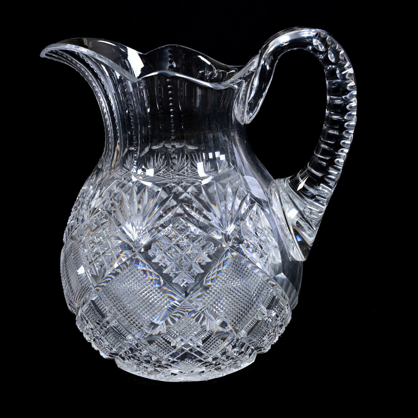 Water Pitcher, American Brilliant Cut Glass: Water Pitcher, American Brilliant Cut Glass, 8.25" x 7.25", Crosscut Diamond, Strawberry Diamond And Fan Motif, Ray Cut Base, Indiana Private Collection.